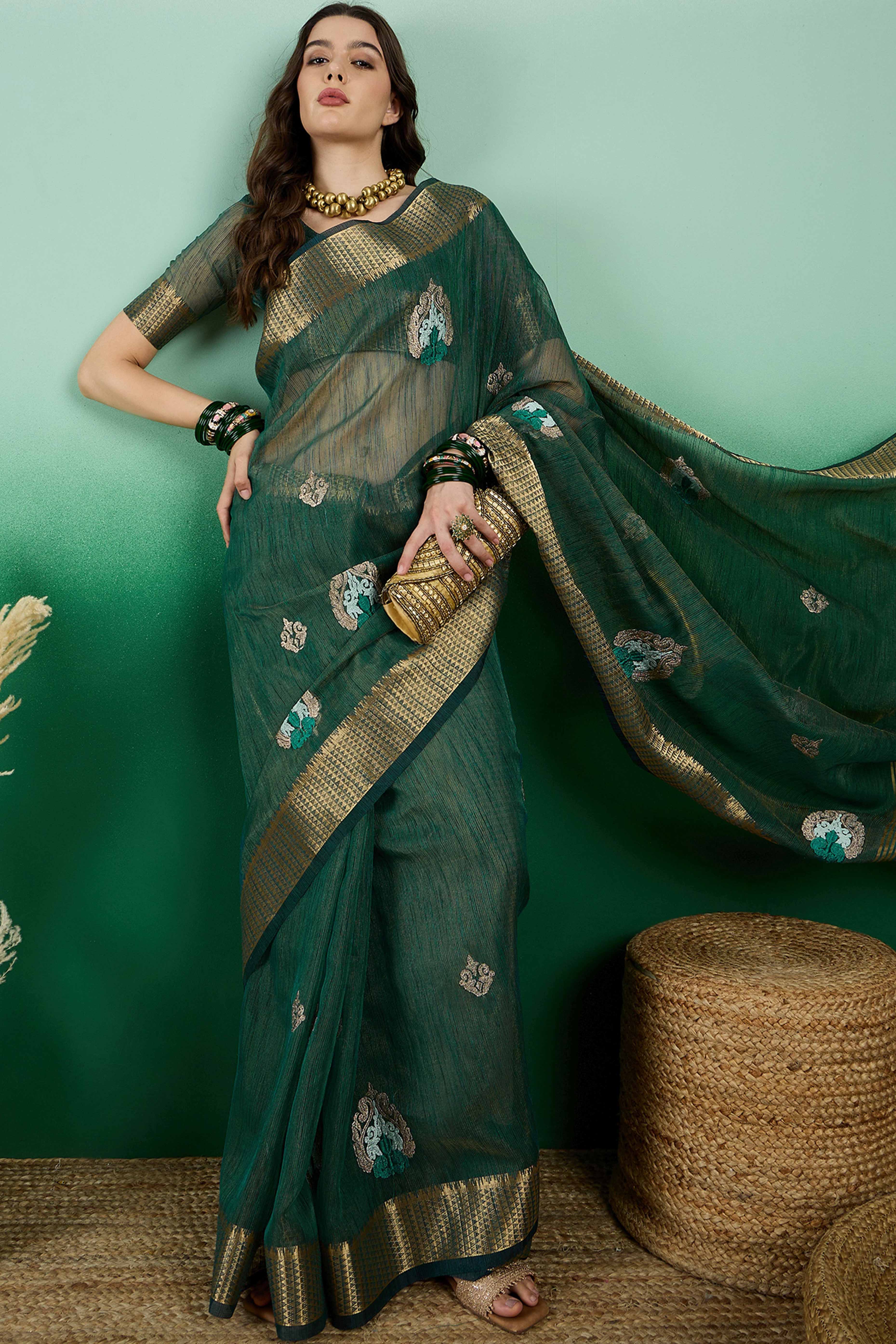 Green Khadi Organza Saree Adorned With Elegant Embroidery & Tassel Pallu