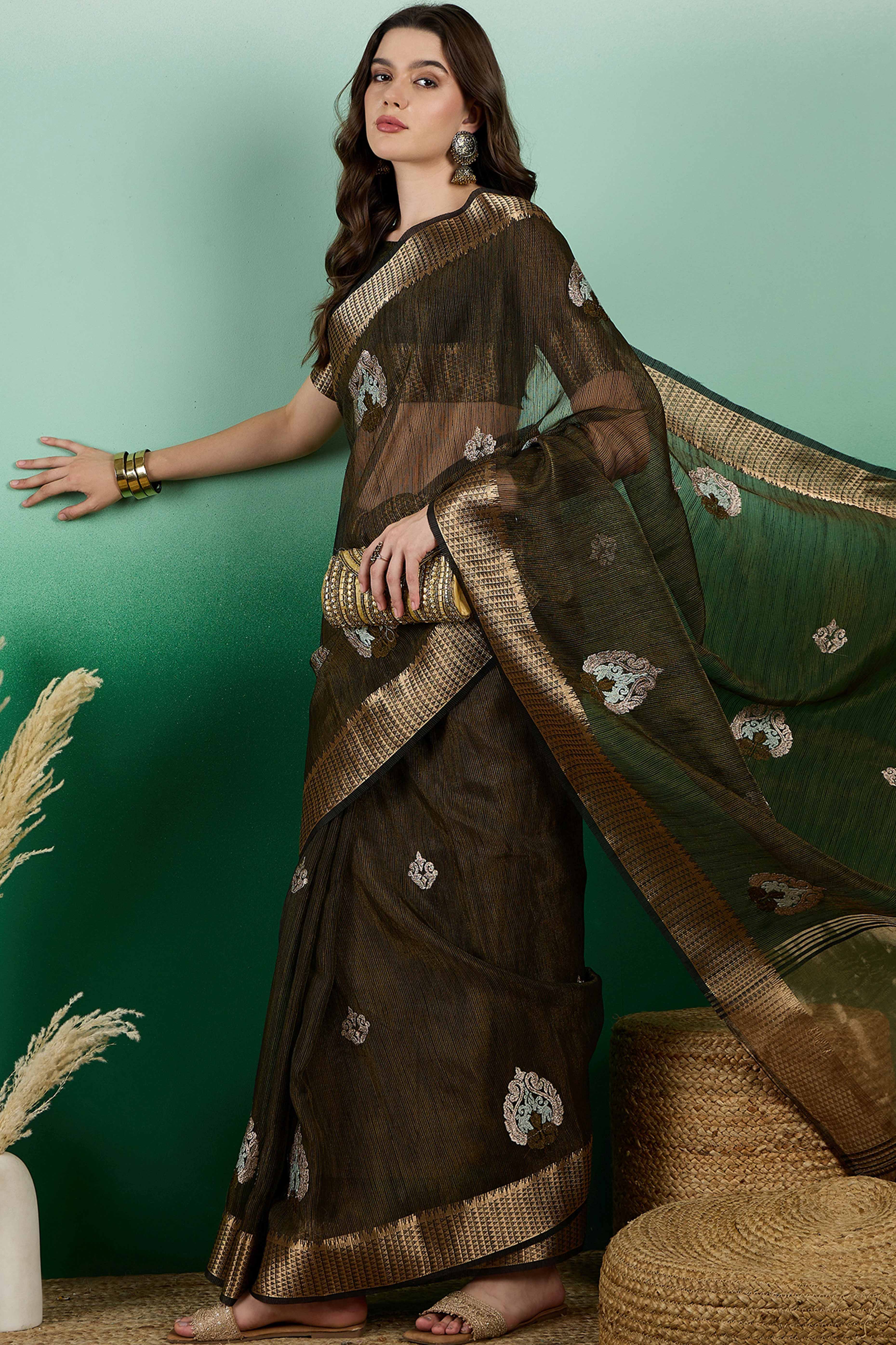 Mehendi Green Khadi Organza Saree Adorned With Elegant Embroidery & Tassel Pallu