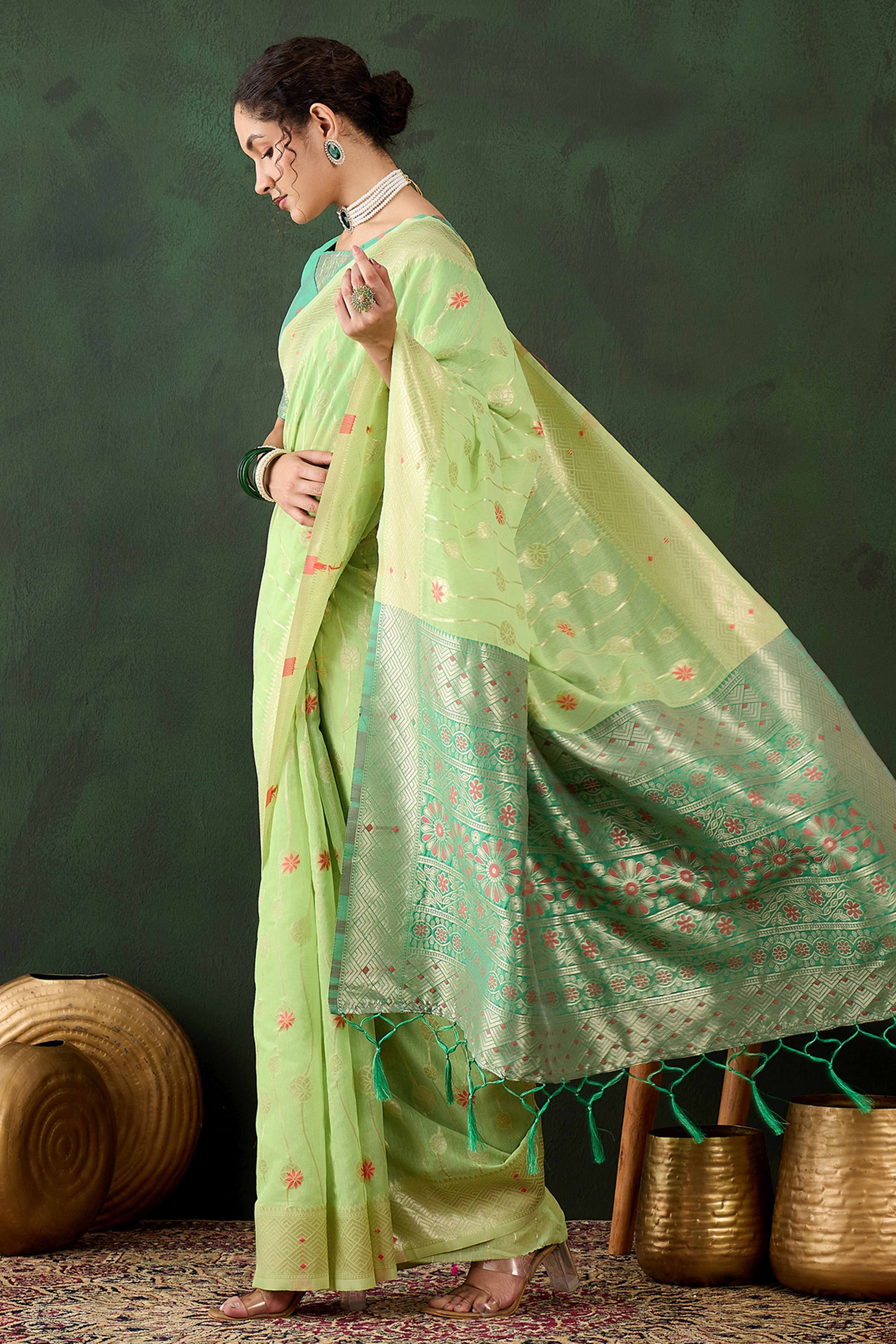 Green Cotton Blend Saree Adorned With Intricate Floral Zari Weaving & A Stylish Tassel Pallu