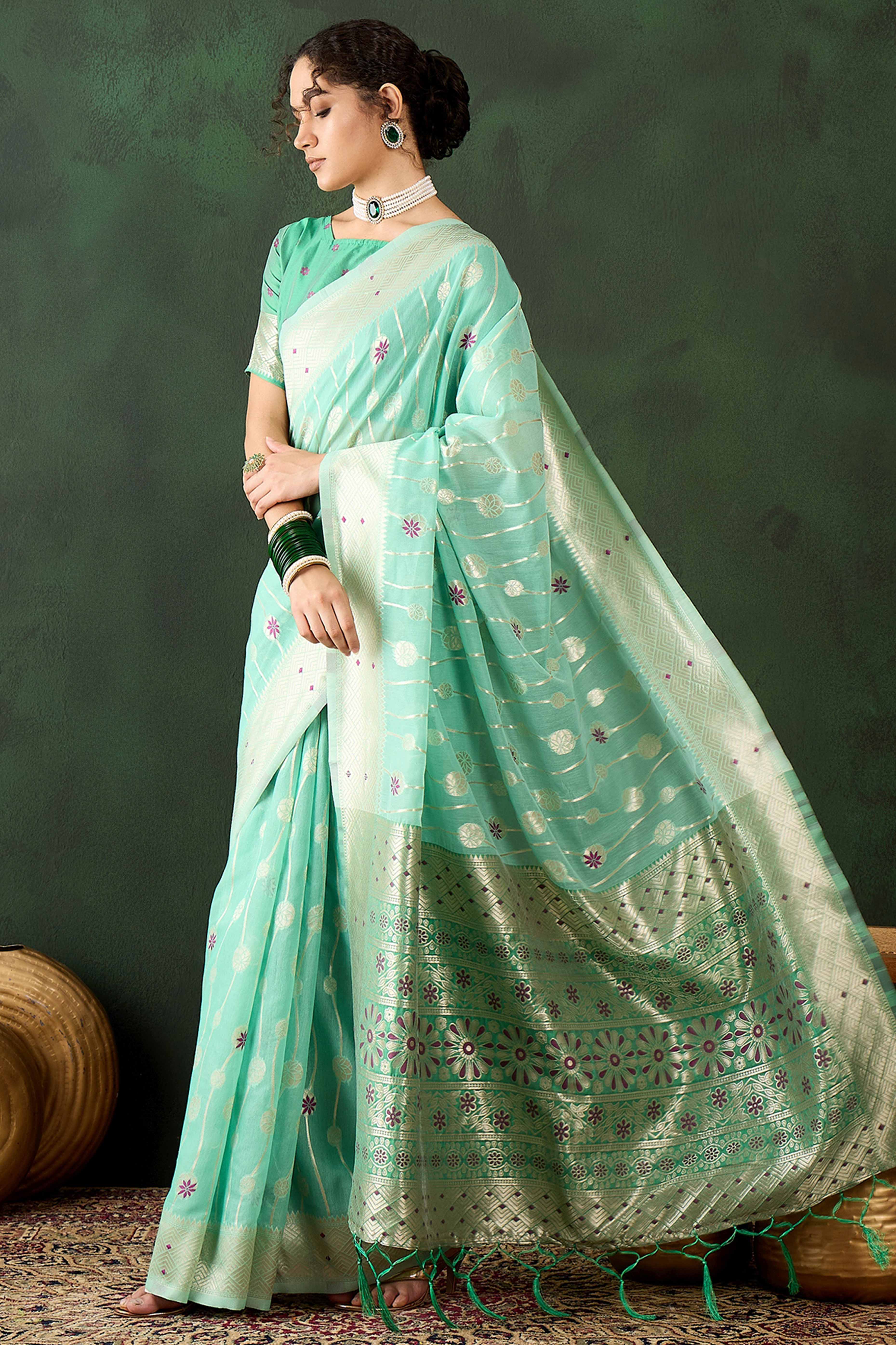 Sea Green Cotton Blend Saree Adorned With Intricate Floral Zari Weaving & A Stylish Tassel Pallu