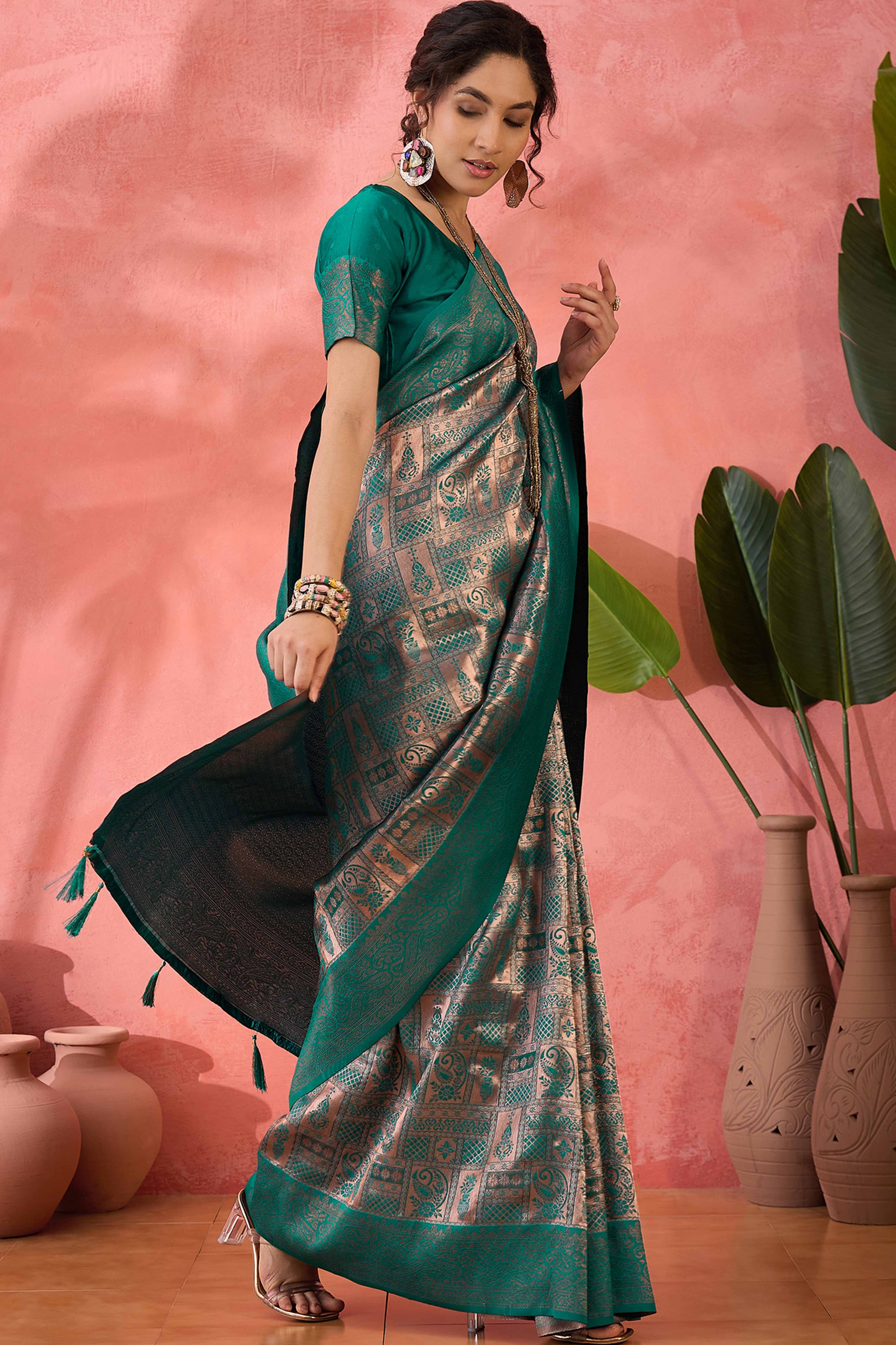 Rama Green Woven Poly Silk Blend Saree Featuring Floral & Paisley Motifs With Tassel Accents