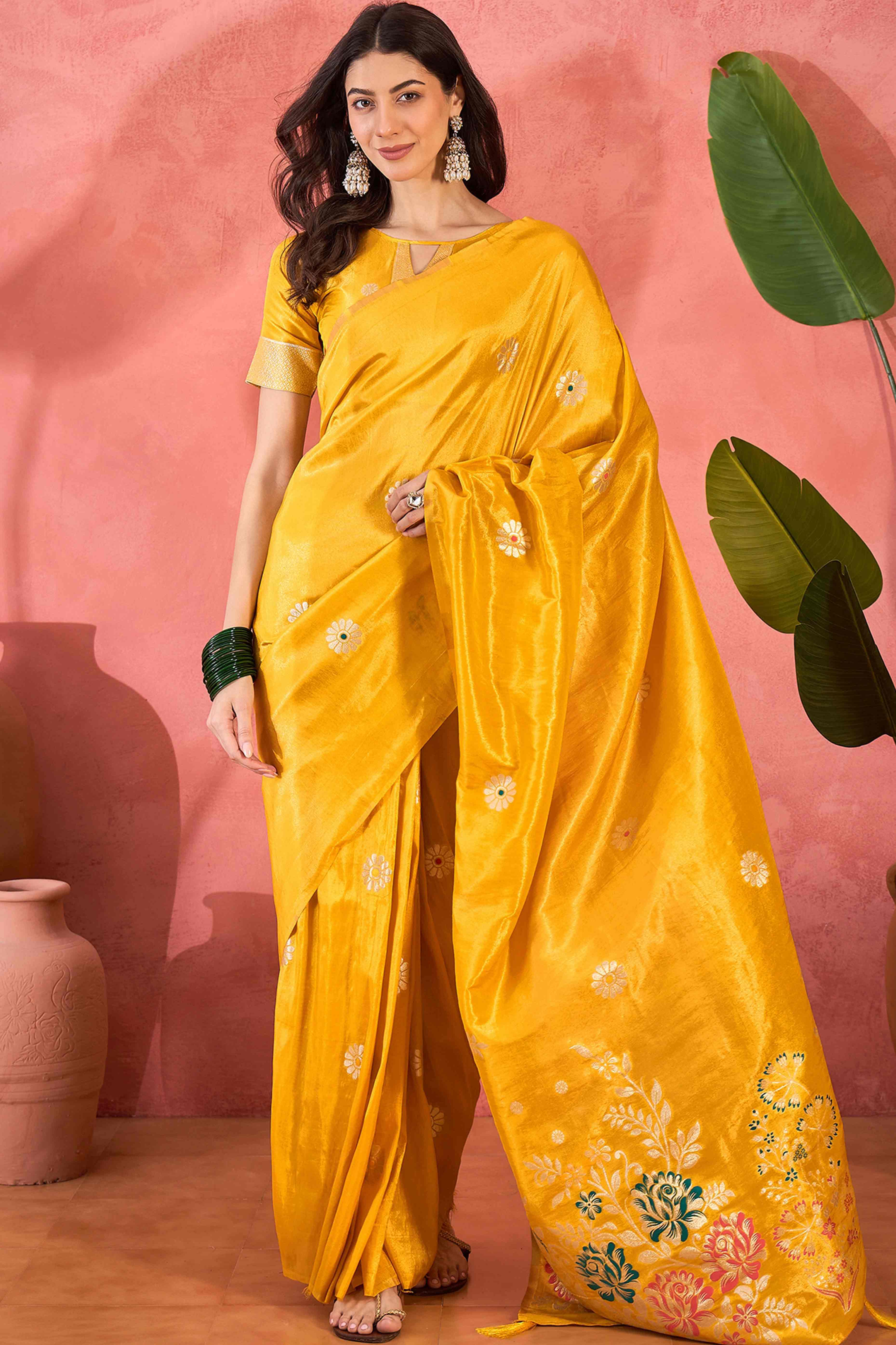 Yellow Shimmer Saree Adorned with Floral Zari Weaving & Tassel Pallu