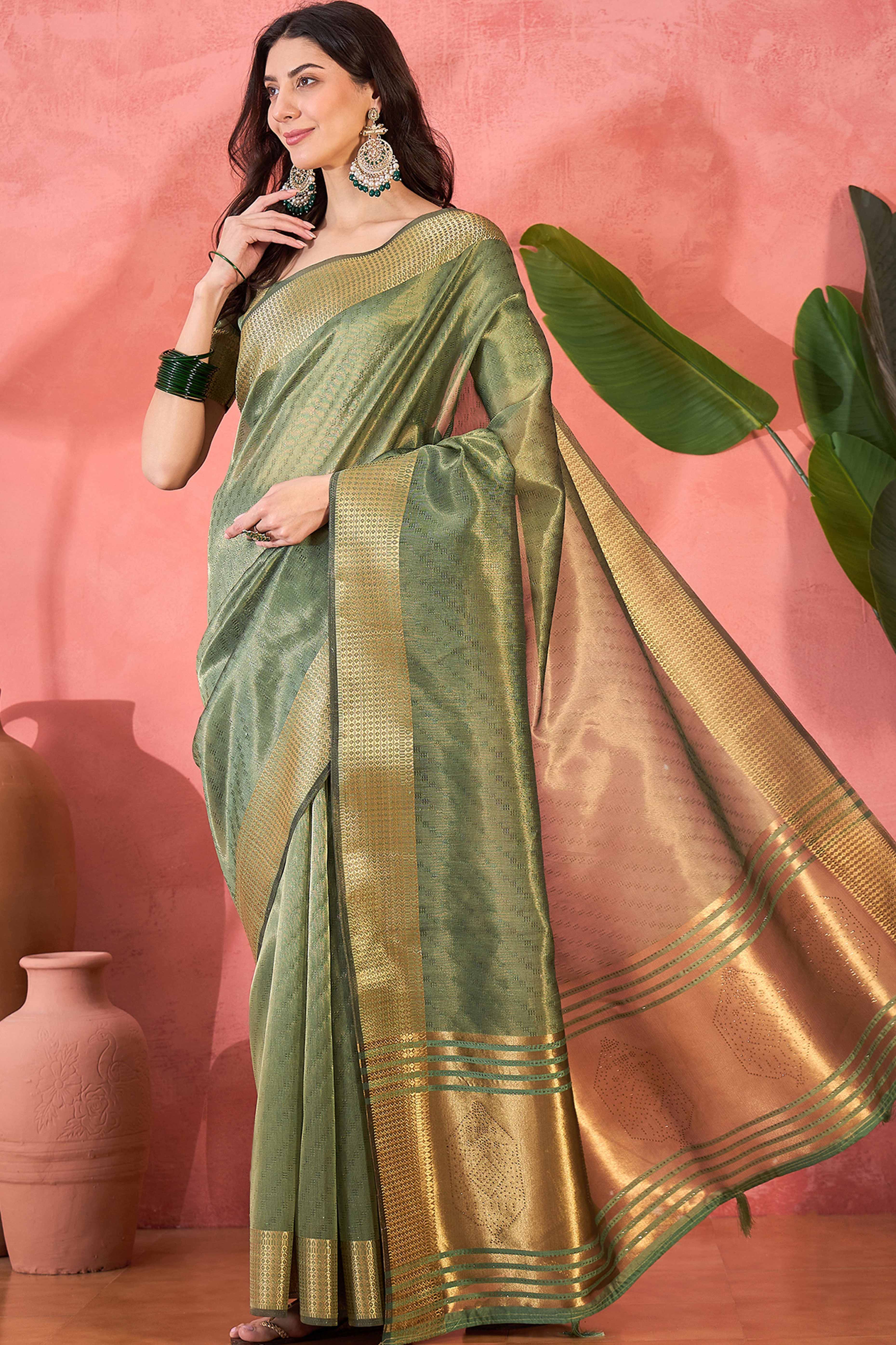 Green Khadi Organza Saree Intricate Weaving & Sparkling Stonework With Tassel Pallu
