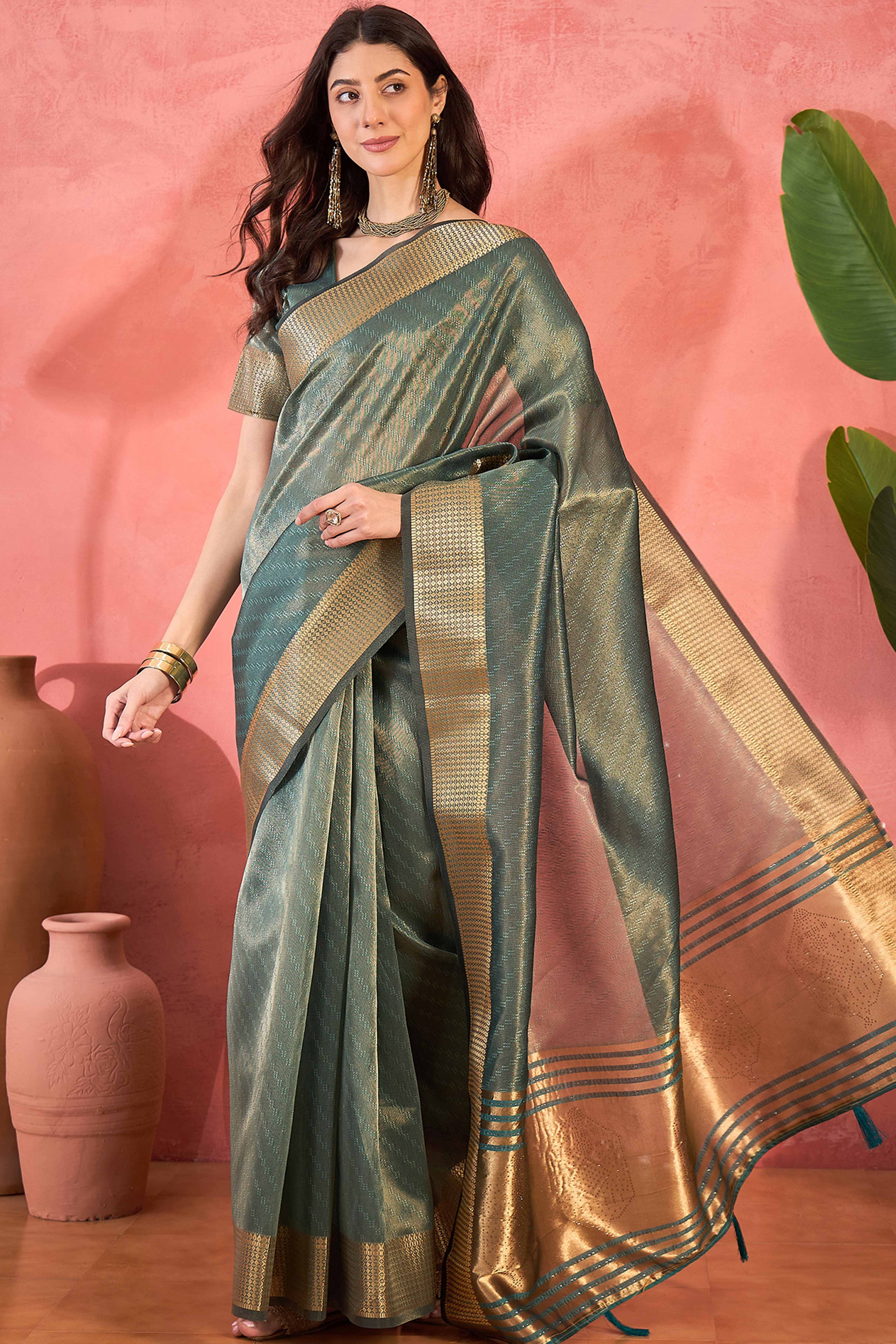 Teal Green Khadi Organza Saree Intricate Weaving & Sparkling Stonework With Tassel Pallu