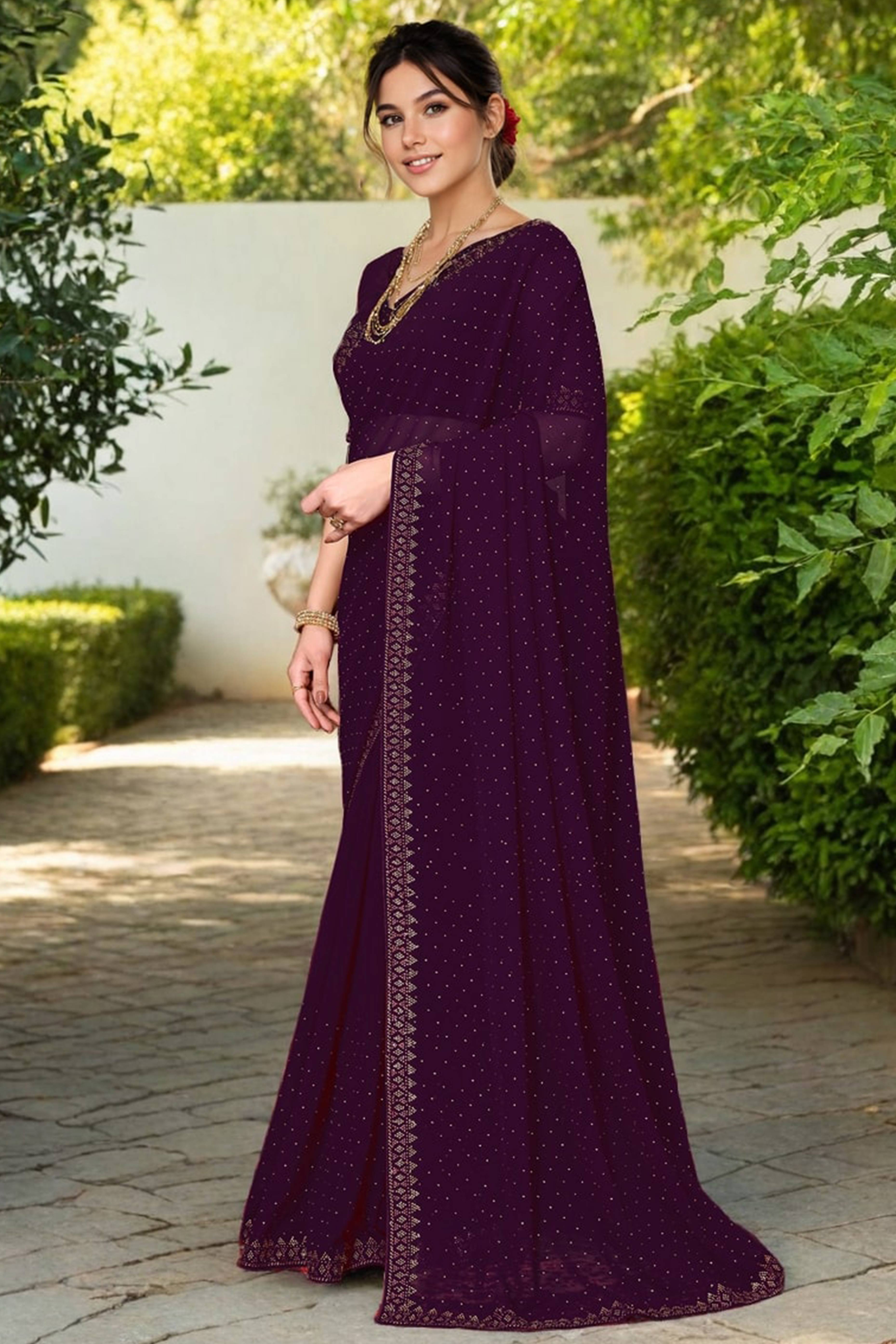 Wine Rangoli Dola Silk Saree Embellished With Diamond Work And Elegant Border