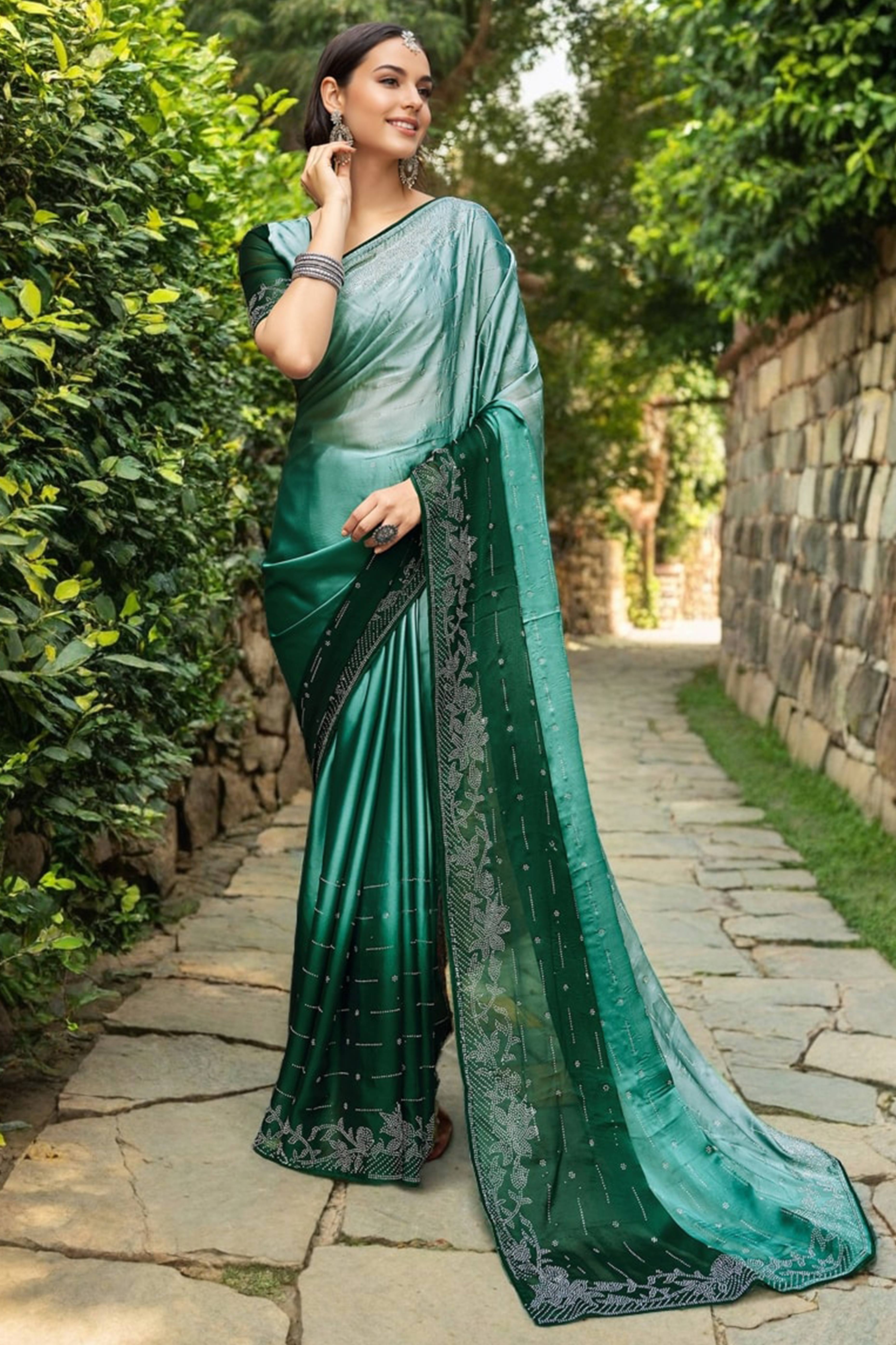 Green Rangoli Dola Silk Saree Adorned With Gleaming Swarovski Work & Classic Floral Border