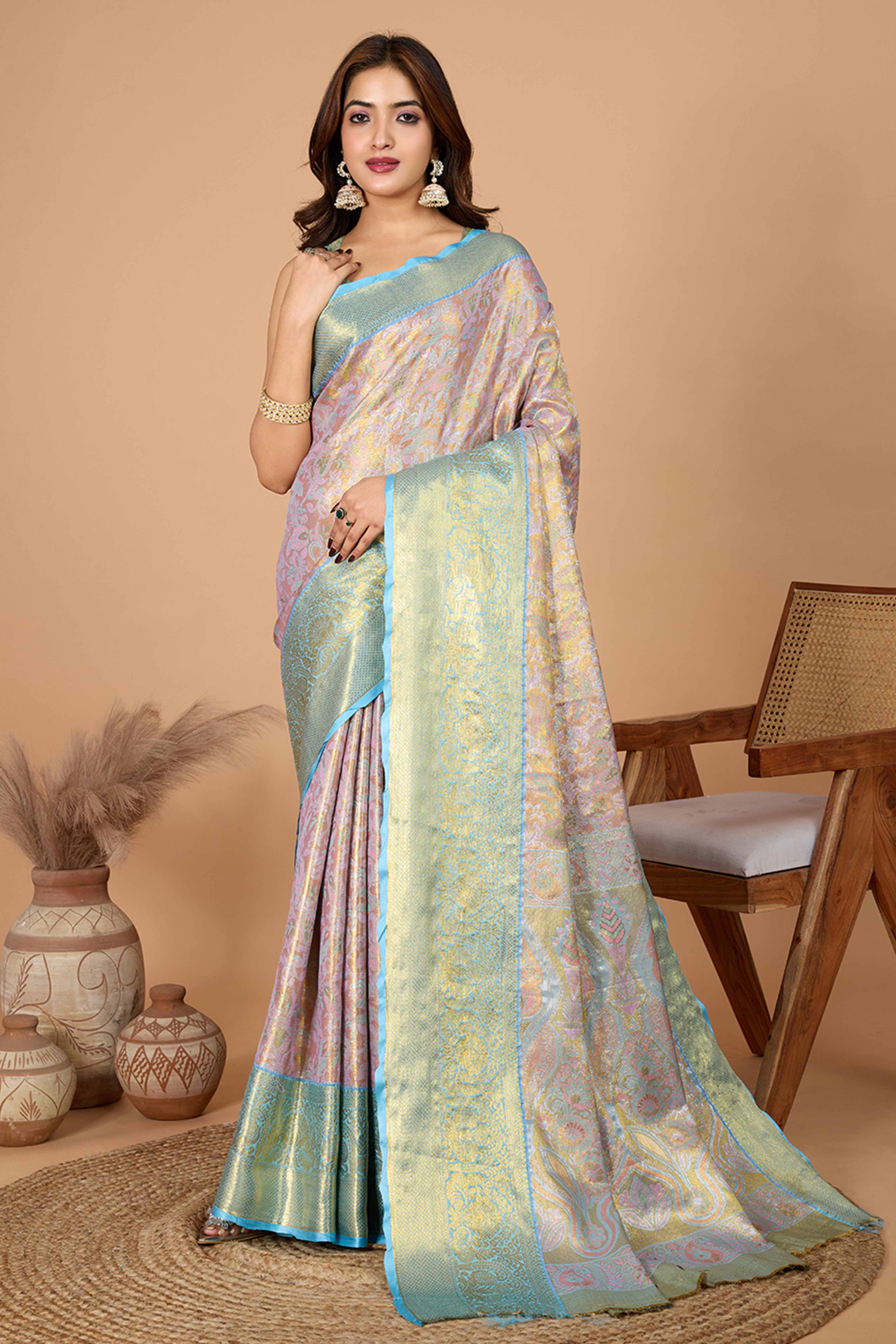 Pink Kanjivaram Silk Saree Adorned With Exquisite Floral Zari Weaving