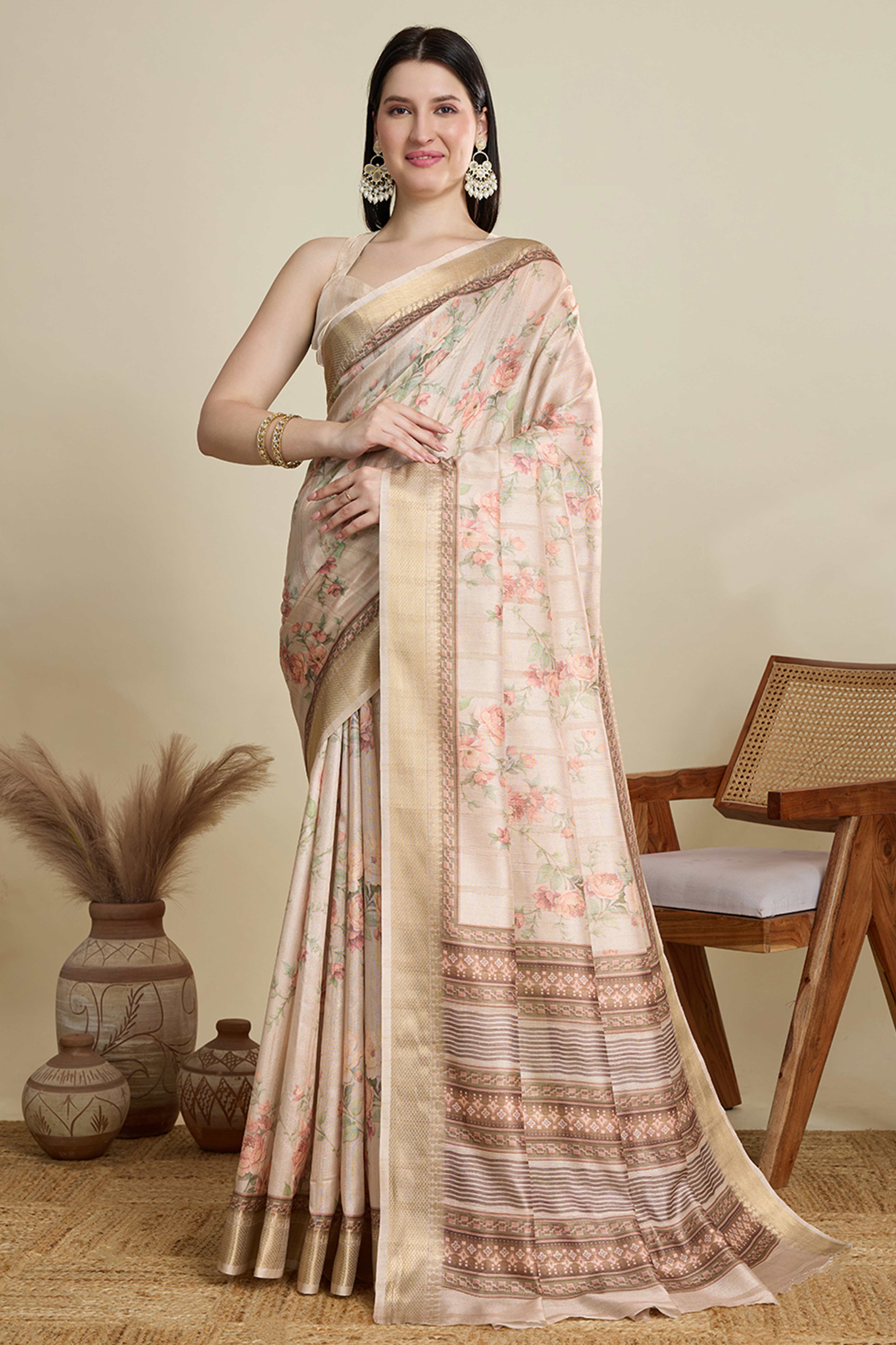 Cream Cotton Blend Saree Featuring Floral Prints and a Festive Zari Border Accent
