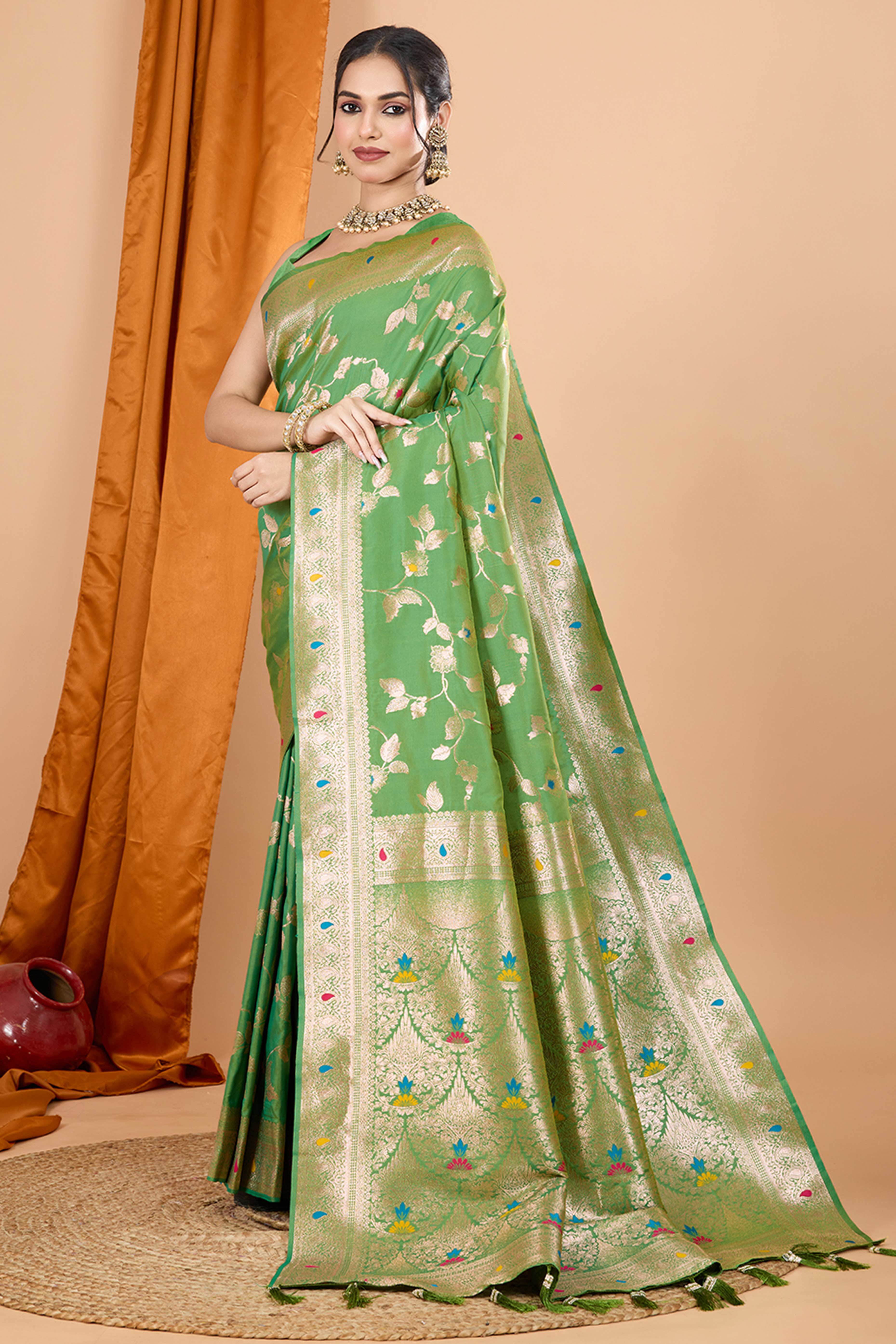 Green Banarasi Silk Saree With Exquisite Floral Zari Weaving and Elegant Tassels