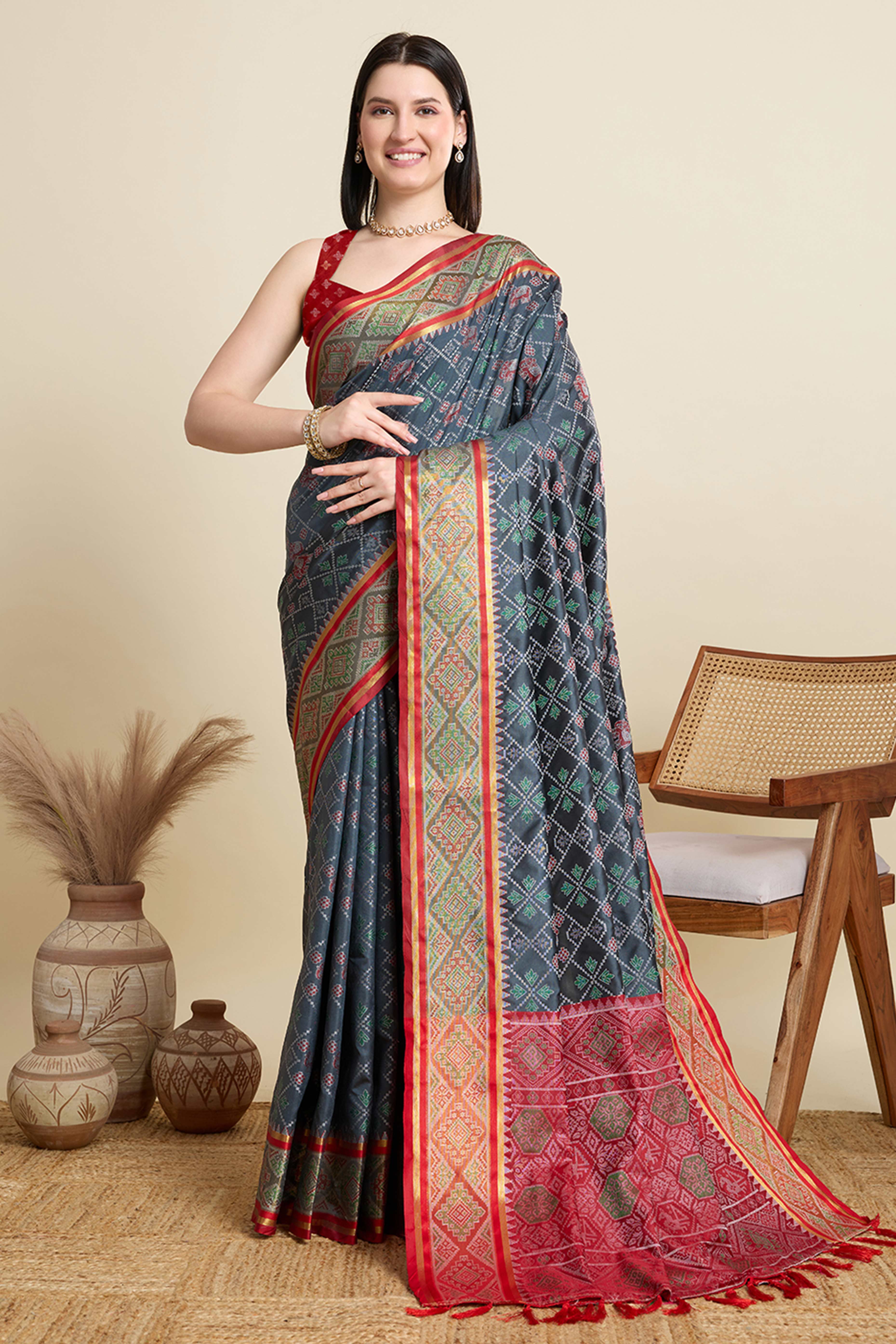 Grey Silk Blend Saree Featuring Patola Prints and a Detailed Weaving Border