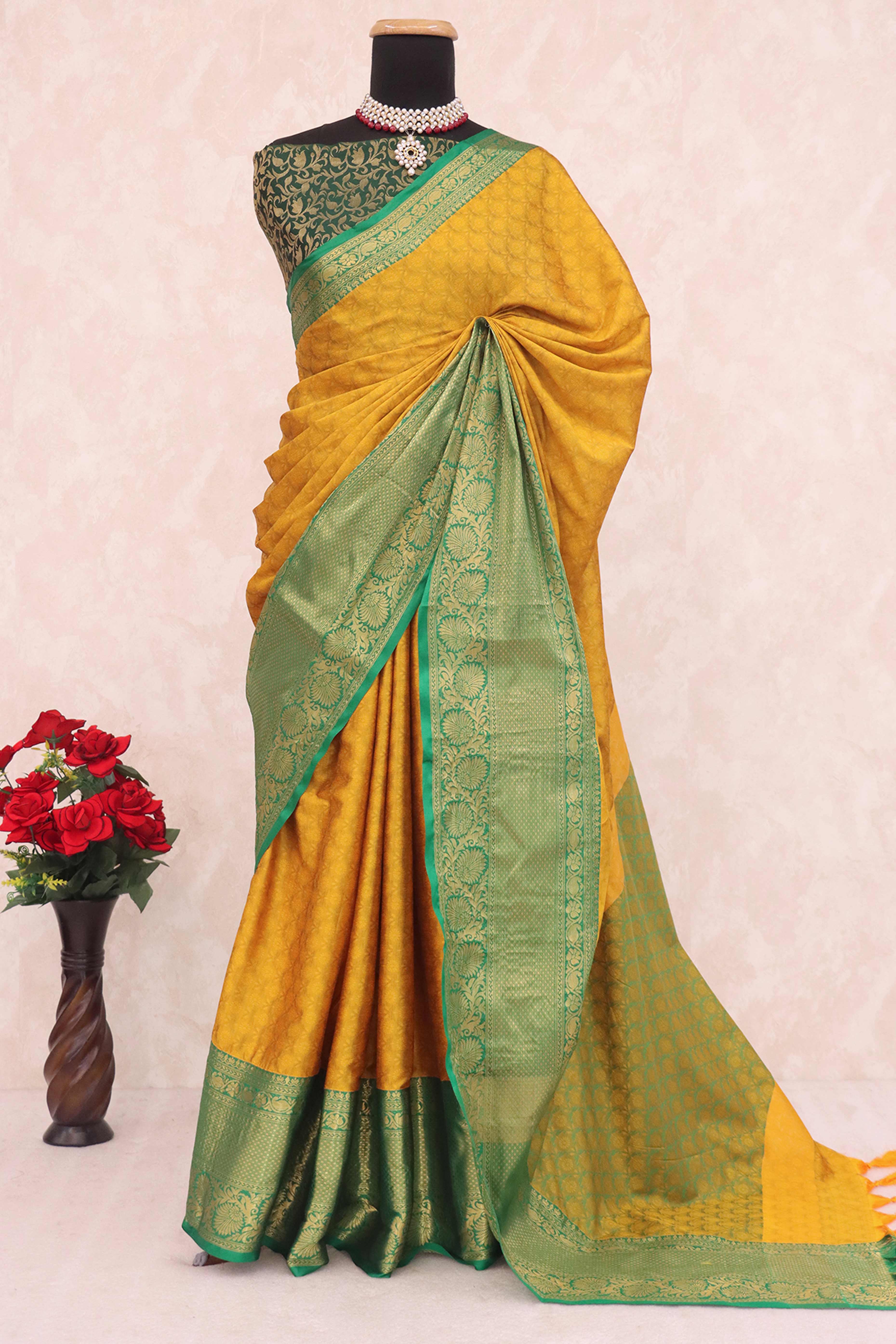 Mustard Silk Blend Saree With Detailed Zari Weaving & Tassel Embellishments