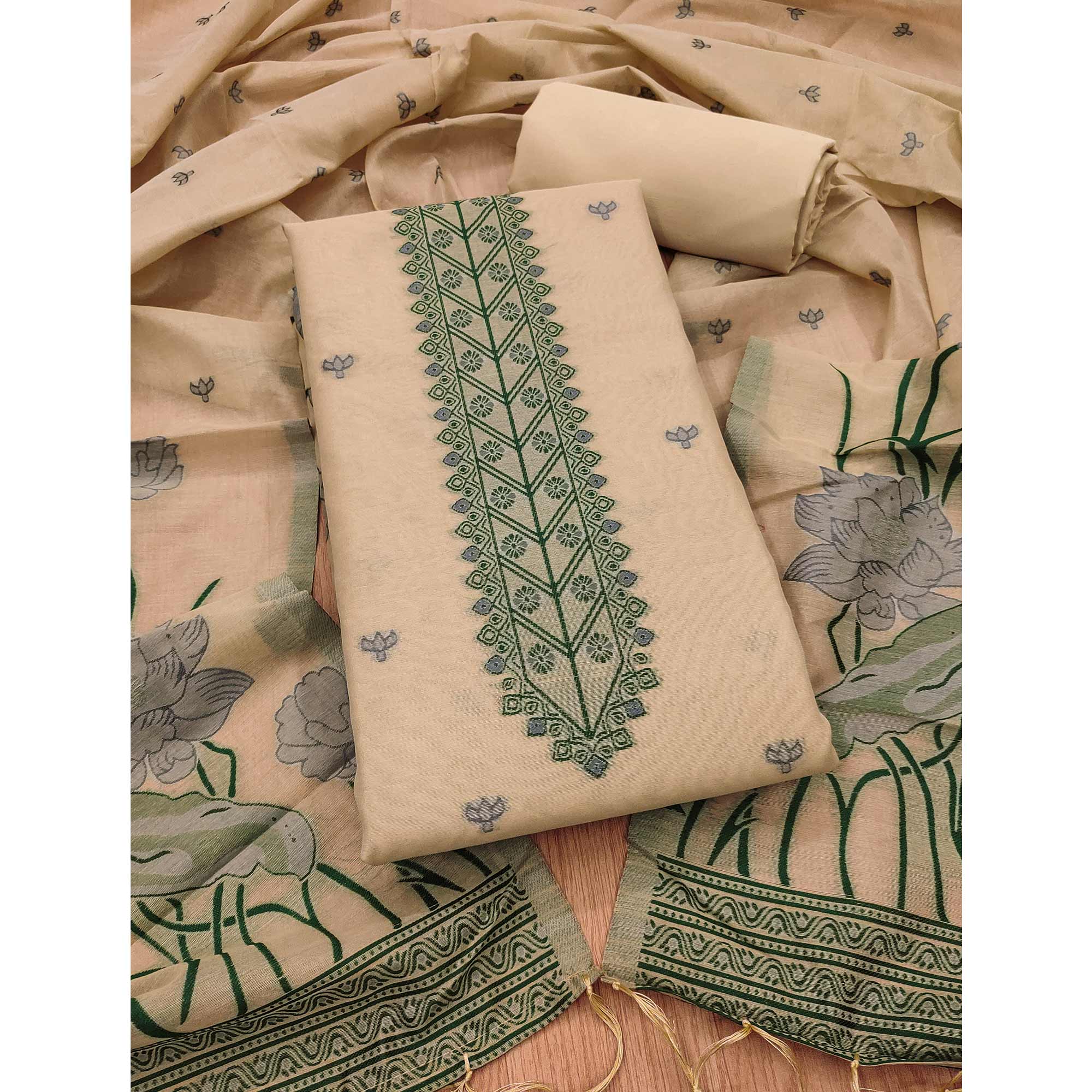 Chikoo Ethnic Dress Material Showcasing Handloom Style Floral Zari Weaving