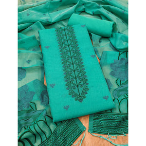 Sea Green Ethnic Dress Material Showcasing Handloom Style Floral Zari Weaving