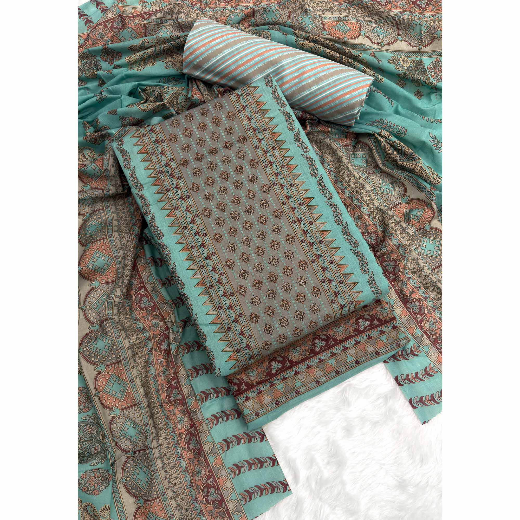 Vibrant Turquoise Pure Cotton Dress Material Featuring Artistic Floral Print