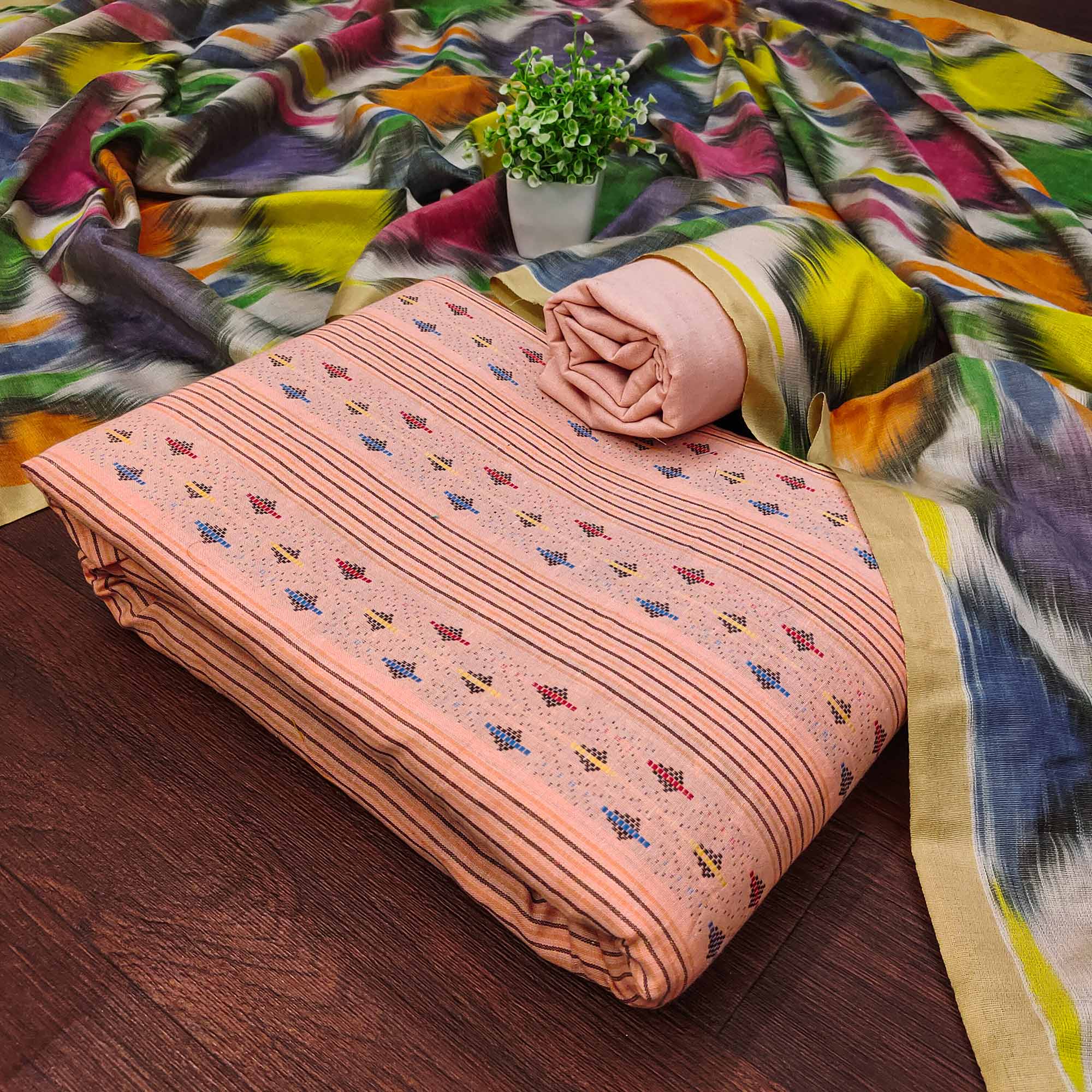 Drape Yourself In Luxury Peach Woven Cotton Blend Dress Material