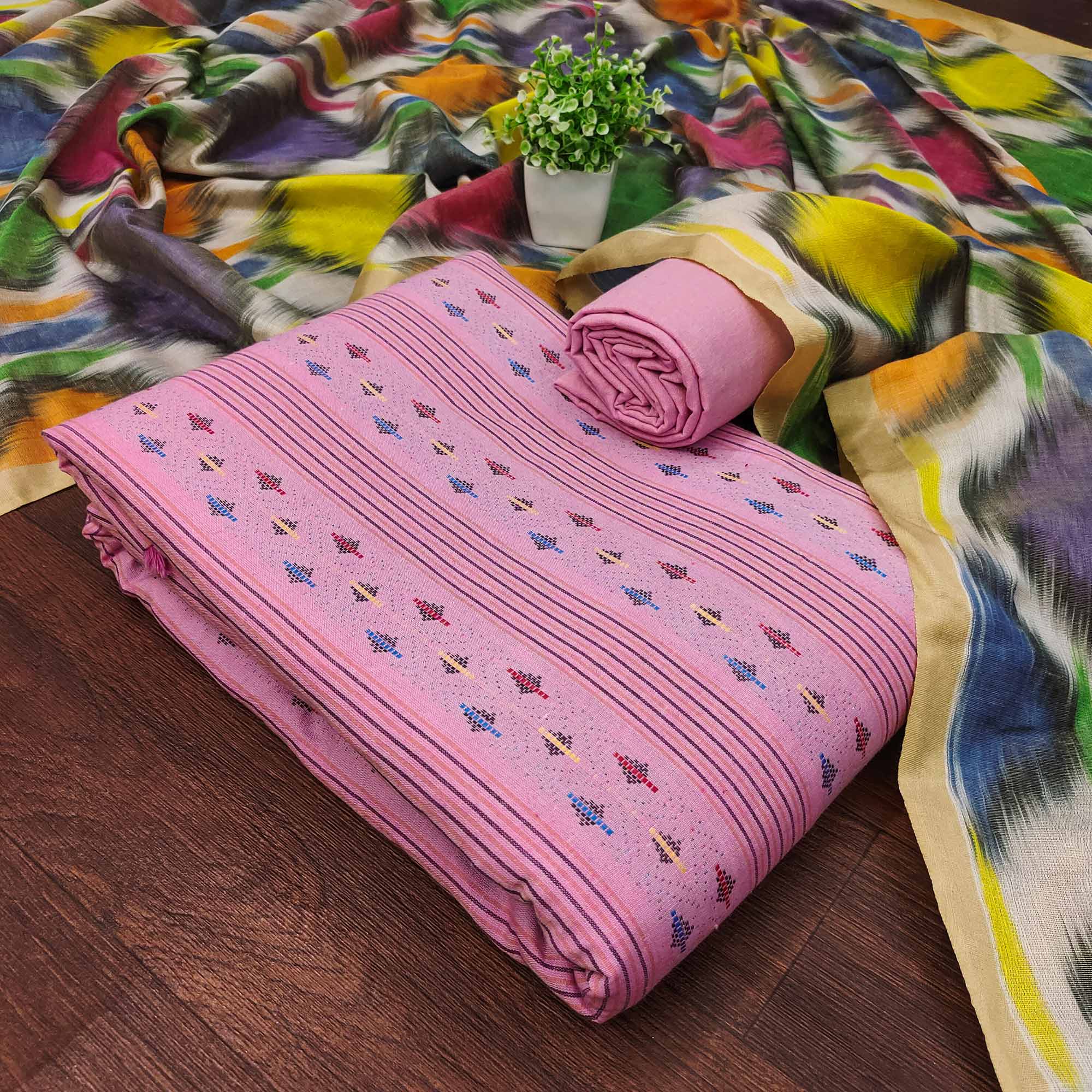 A Mesmerizing Creation Pink Woven Cotton Blend Dress Material