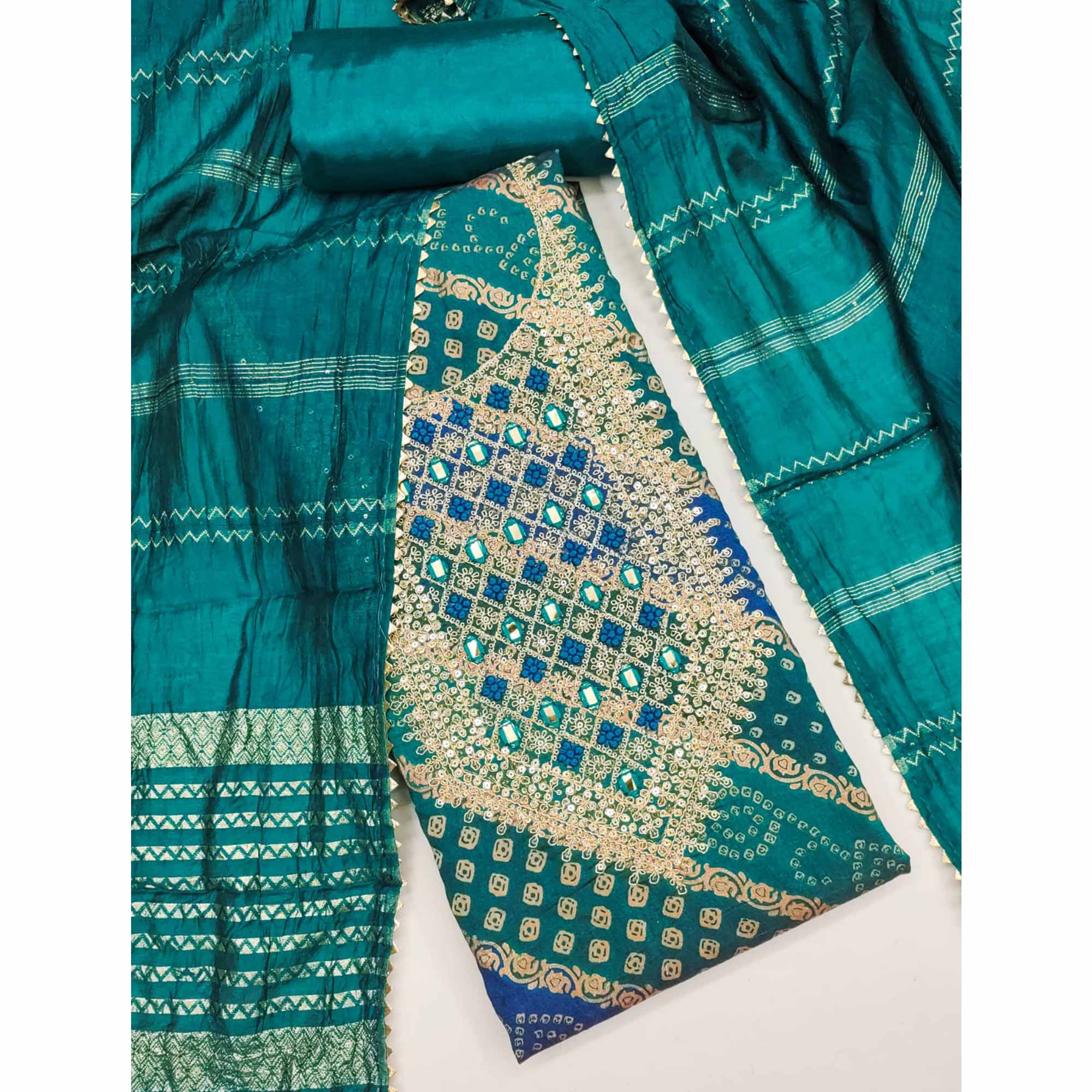 Teal Bandhani Print On Roman Chanderi Silk With Cording & Sequins Work Dress Material