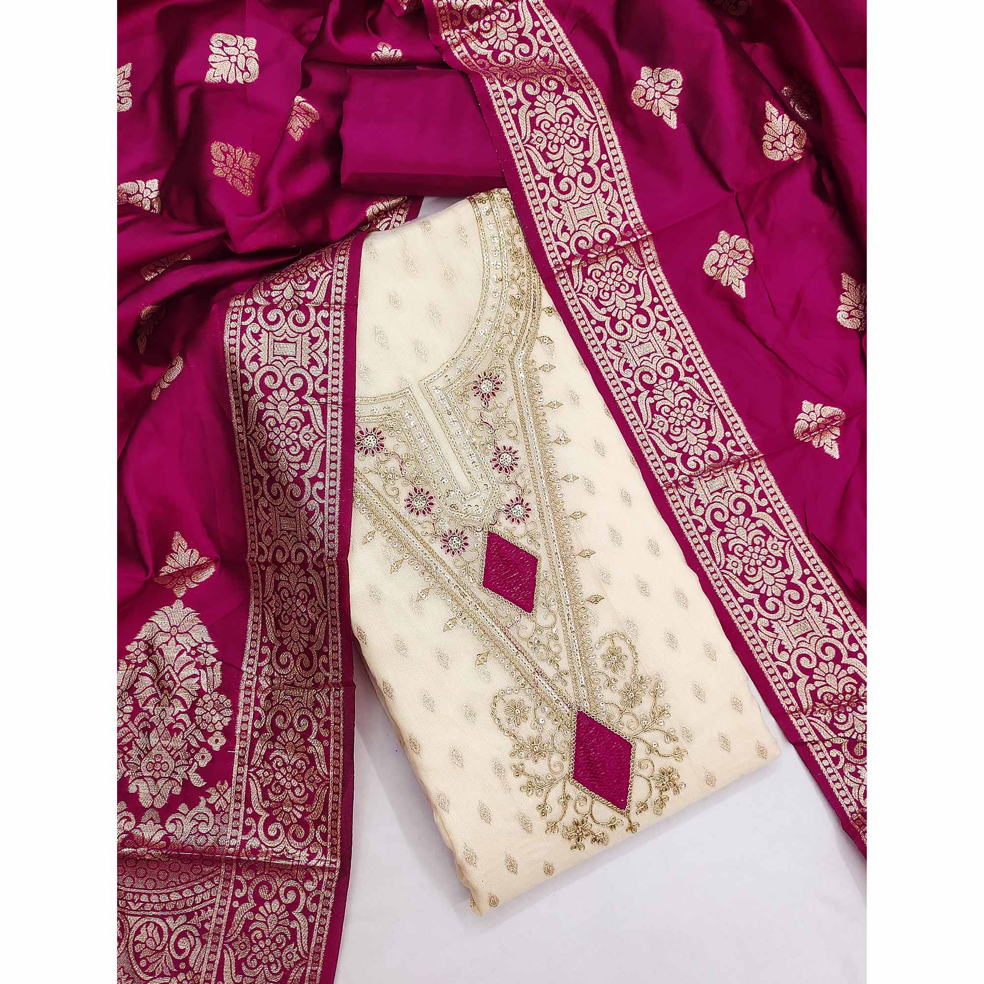 Cream & Rani Pink Floral Butti Weaving With Intricate Cording Embroidered Shimmer Dress Material