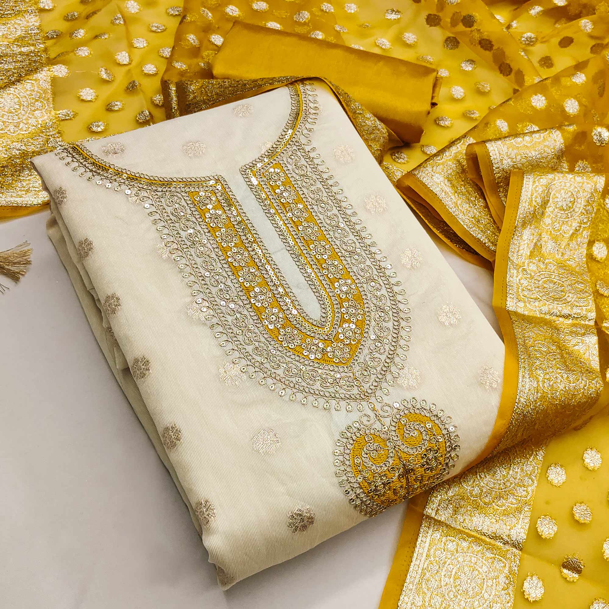 Graceful Cream & Mustard Butti Weaving Shimmer Dress Material Adorned With Cording Embroidery Work