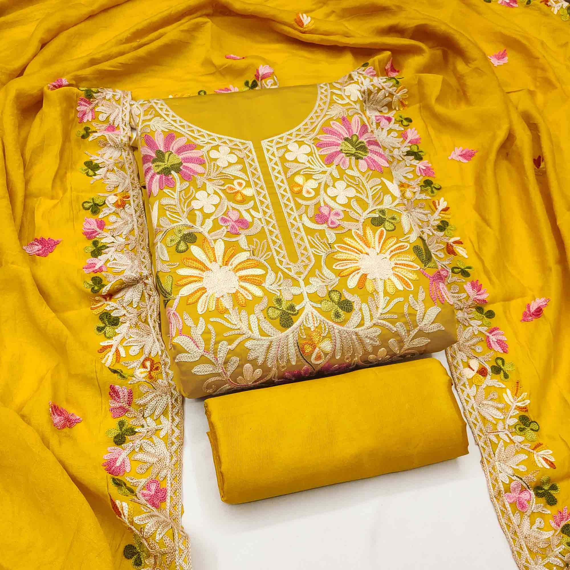 Mustard Designer Roman Art Silk Dress Material Adorned With Floral Thread Embroidery Work