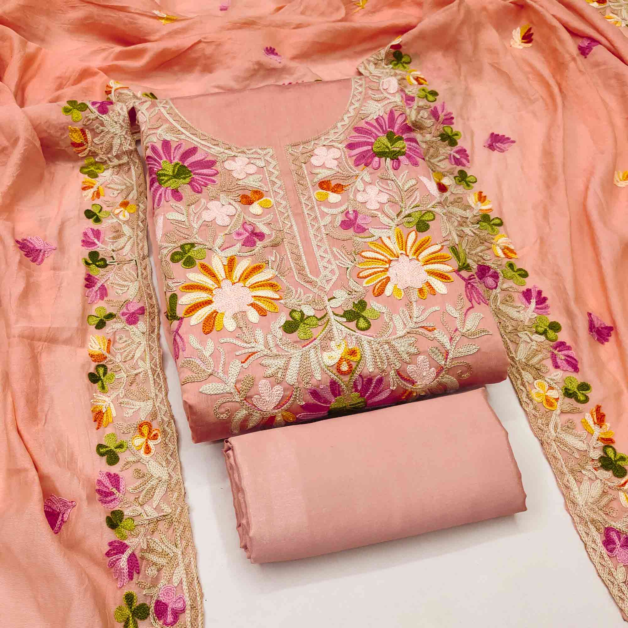 Peach Designer Roman Art Silk Dress Material Adorned With Floral Thread Embroidery Work