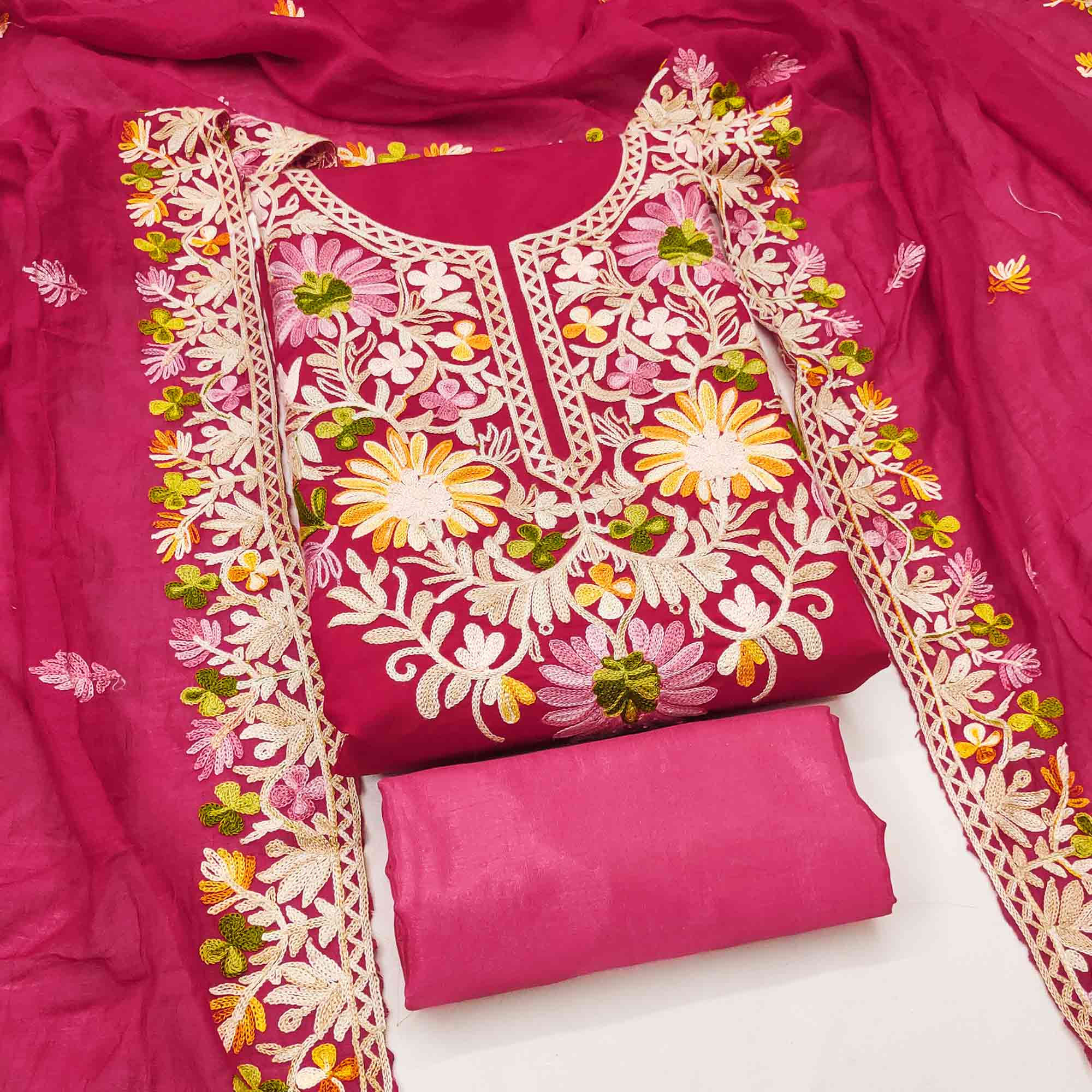 Rani Pink Designer Roman Art Silk Dress Material Adorned With Floral Thread Embroidery Work