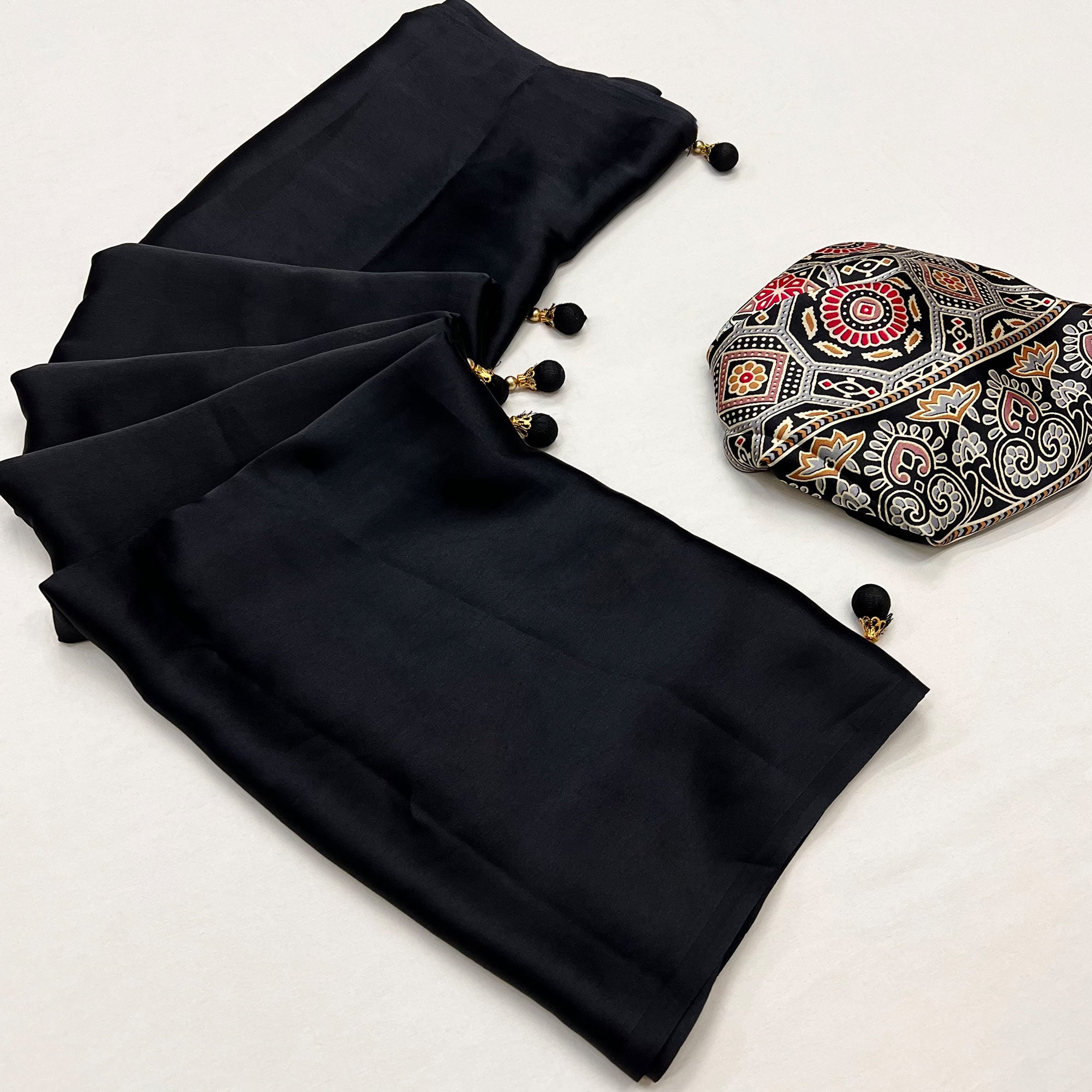 Black Ajrakh Printed Crepe Satin Saree With Tassels