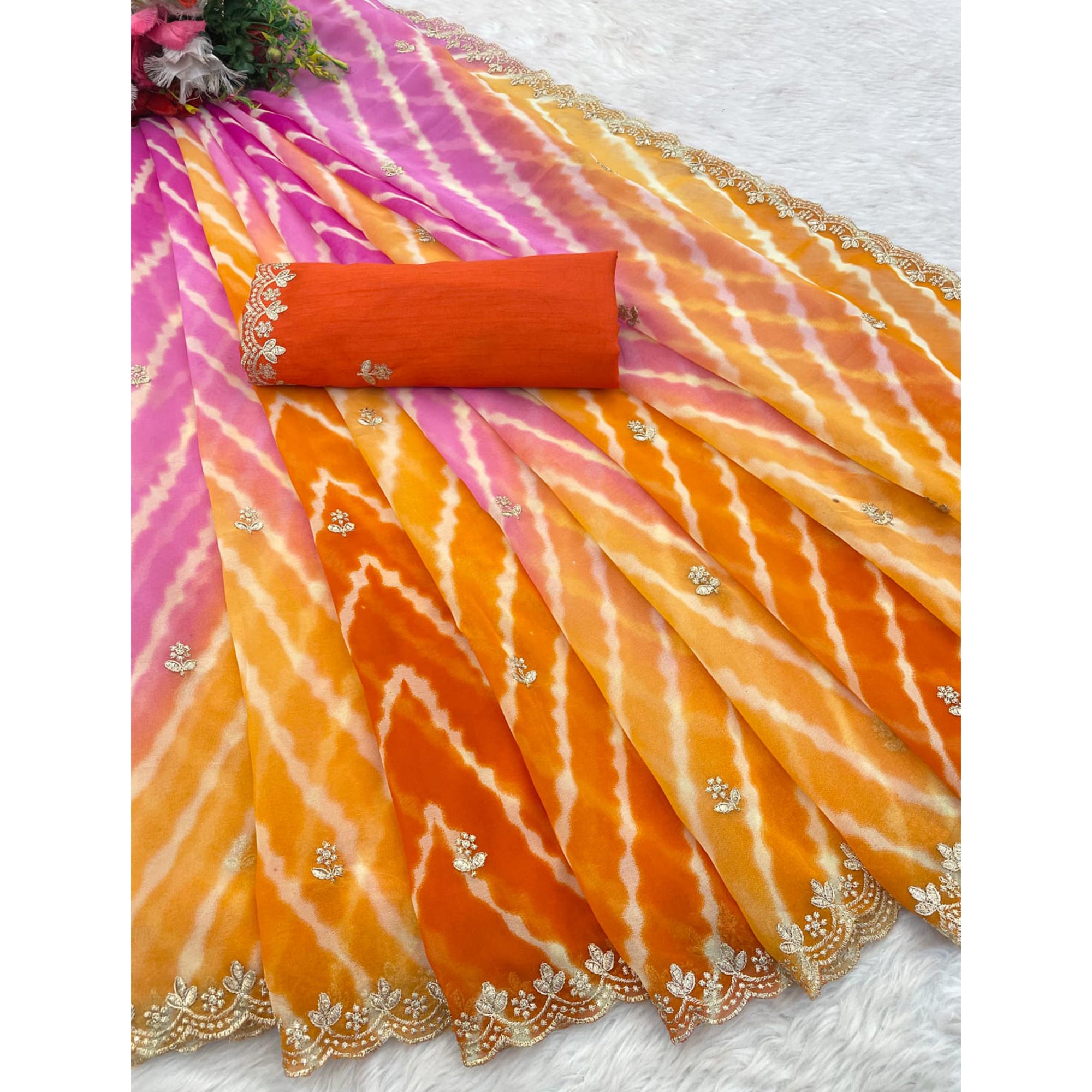 Festive Georgette Saree in Orange & Purple with Ethnic Leheriya Print and Fine Embroidery