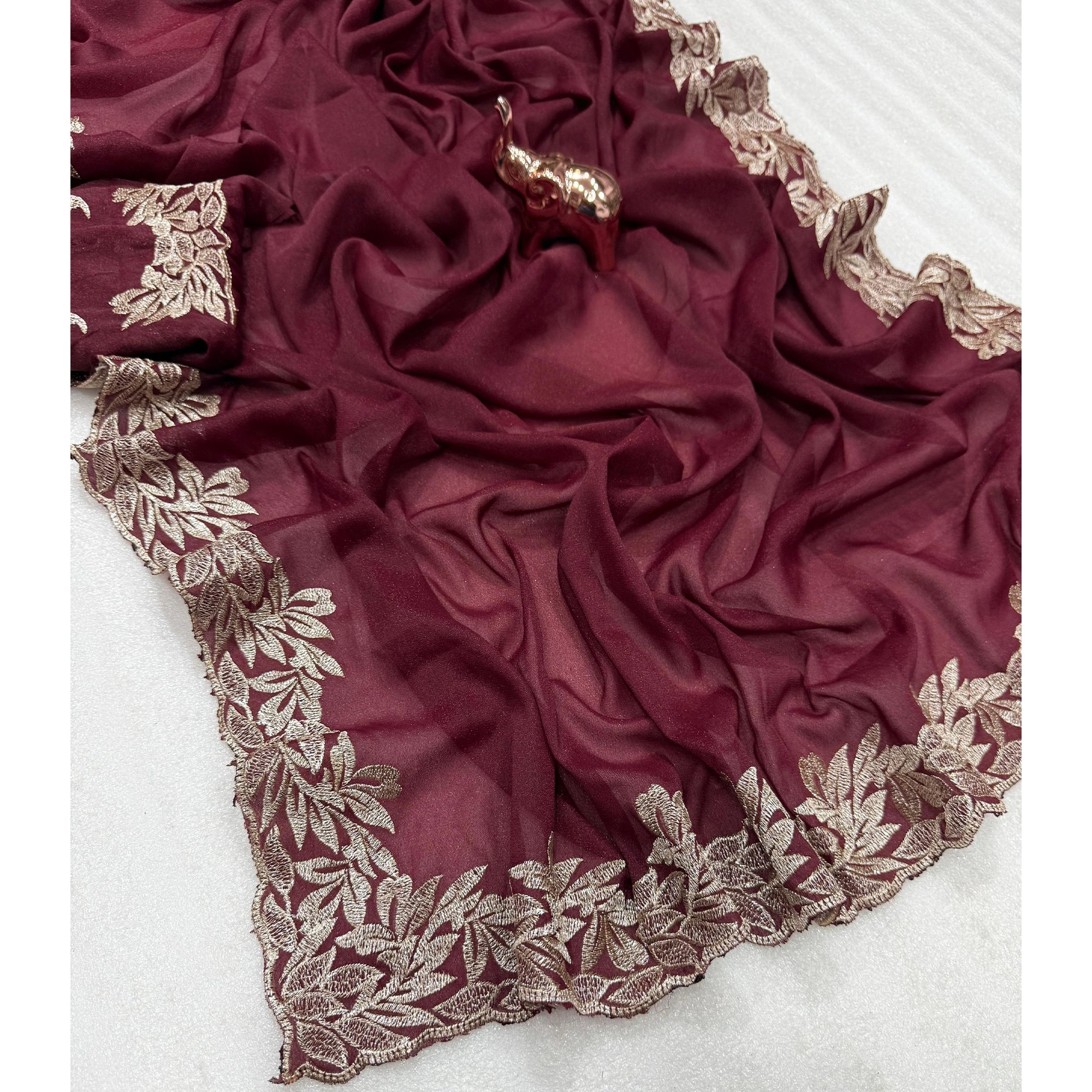 Stylish Maroon Star Chiffon Saree with Traditional Zari Embellished Border