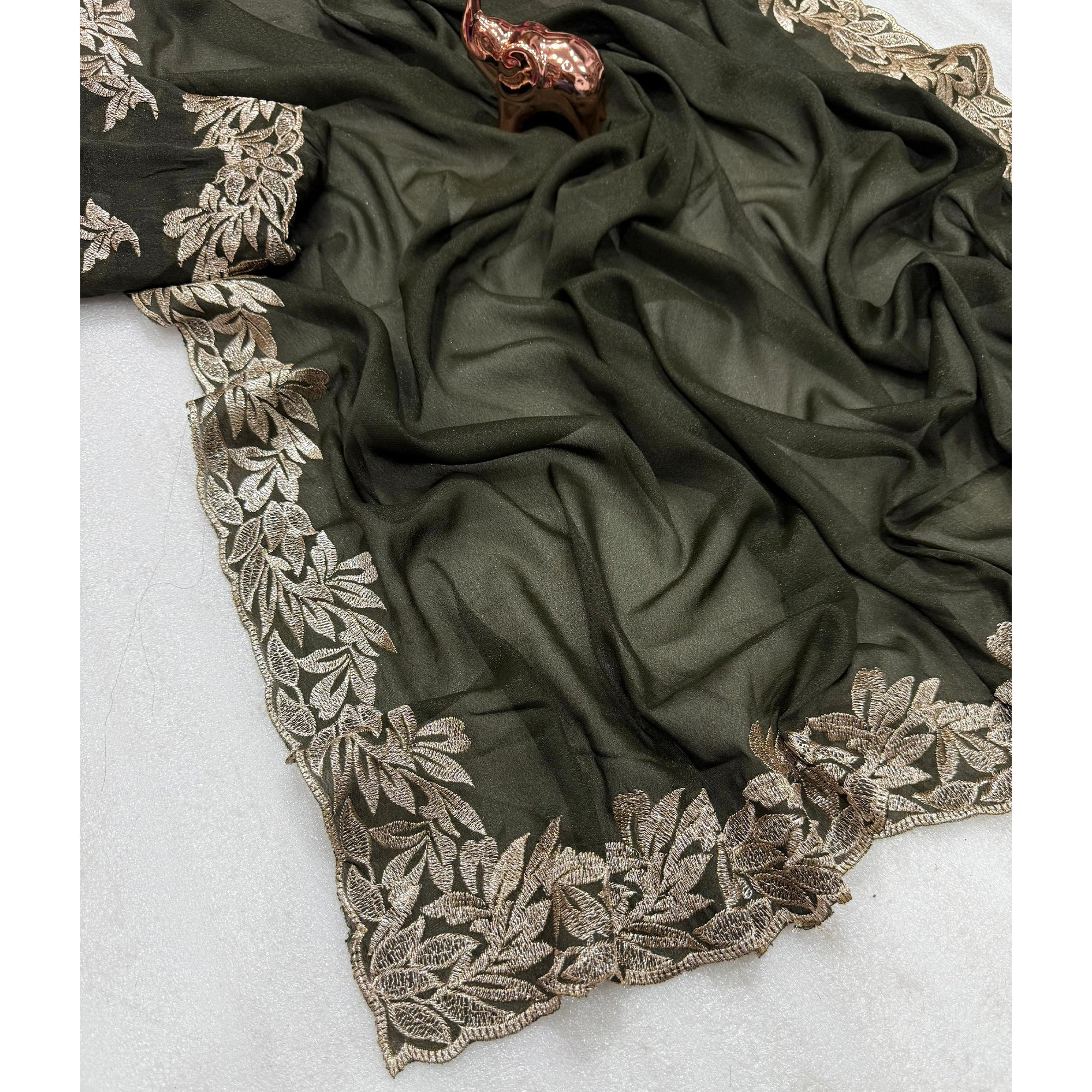 Stylish Mehendi Green Star Chiffon Saree with Traditional Zari Embellished Border