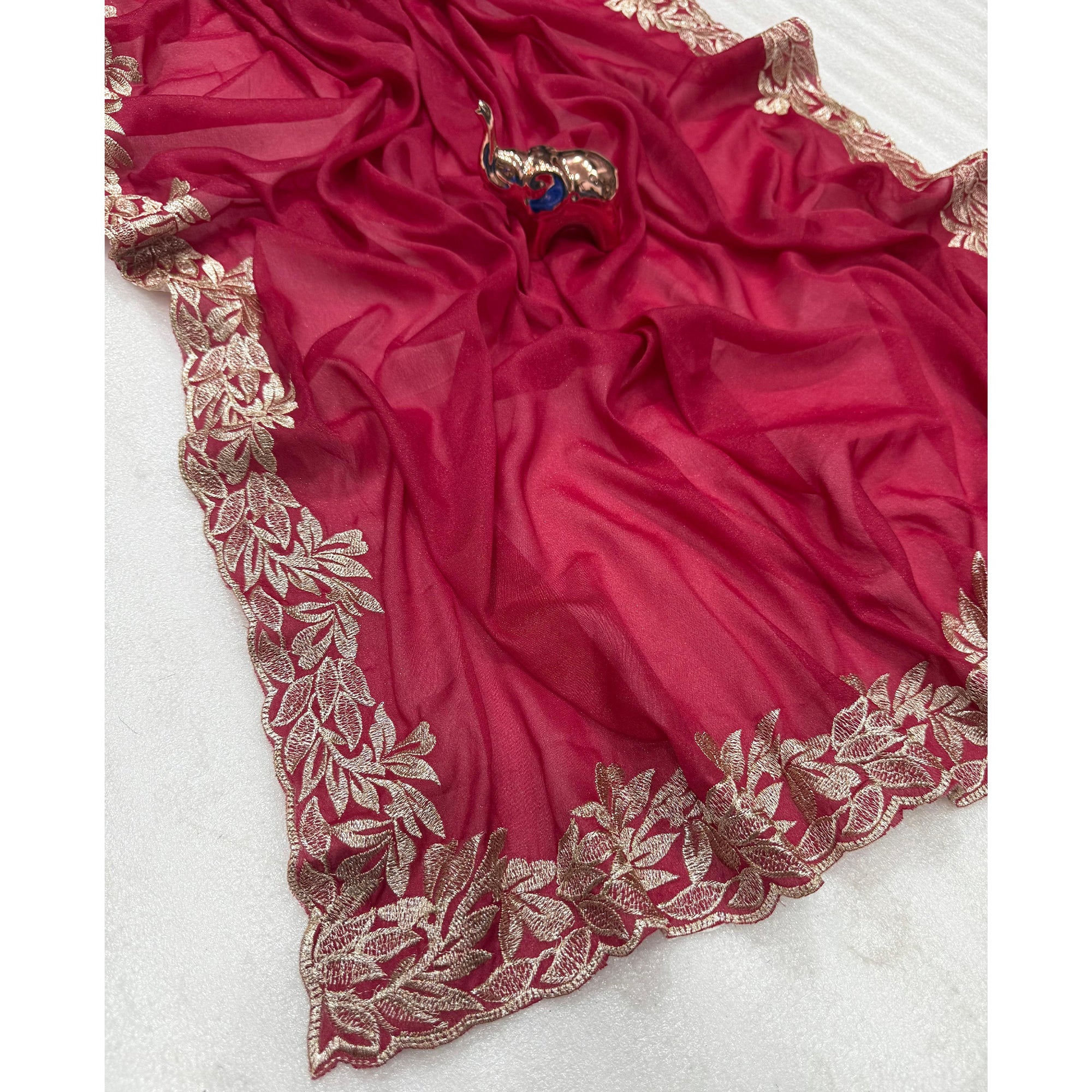 Stylish Pink Star Chiffon Saree with Traditional Zari Embellished Border