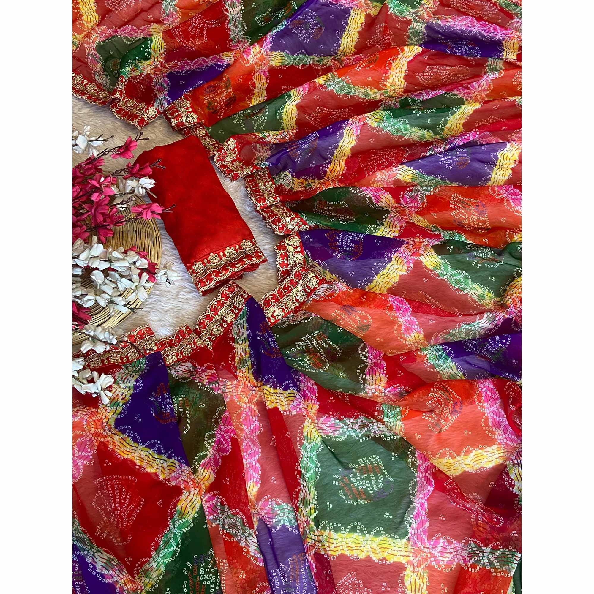 Red Georgette Saree with Bandhani Motifs and Elegant Border Embroidery