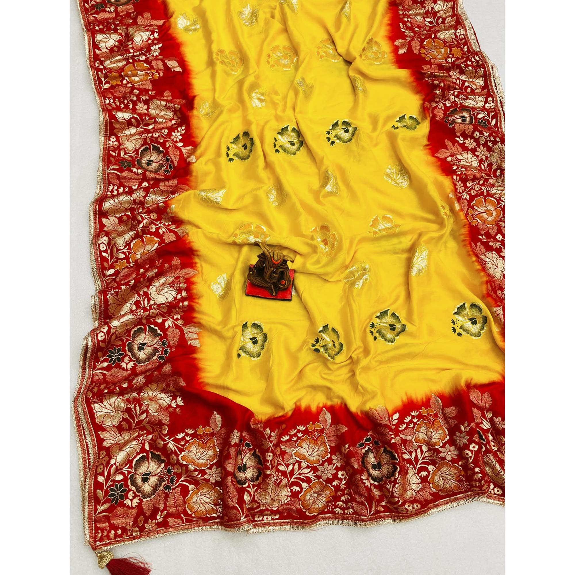 Yellow Floral Woven Pure Silk Saree With Tassels