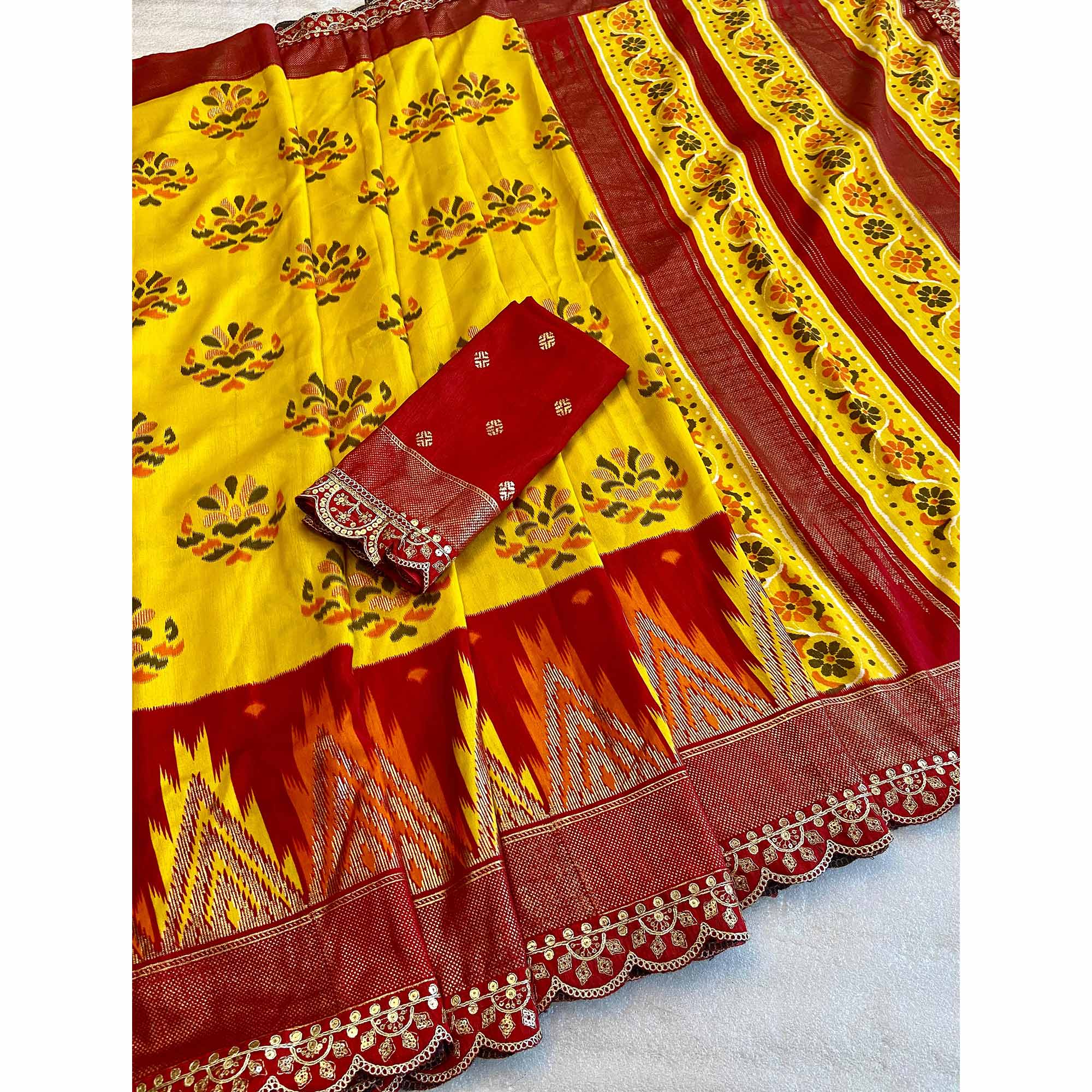 Yellow Patola Printed Dola Silk Saree With Sequins Border