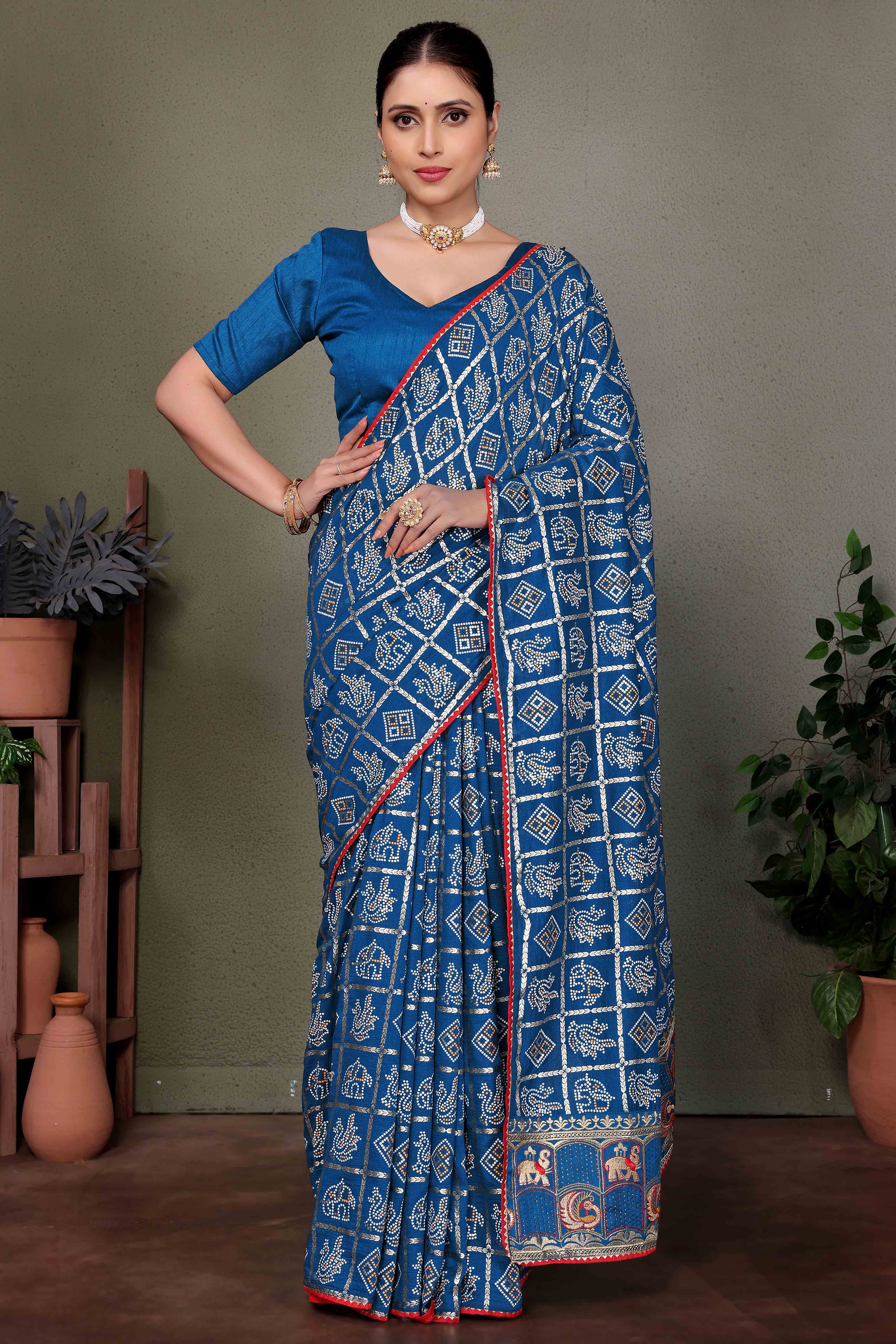 Blue Vichitra Silk Saree Featuring Bandhani Patterns and Graceful Embroidered Borders