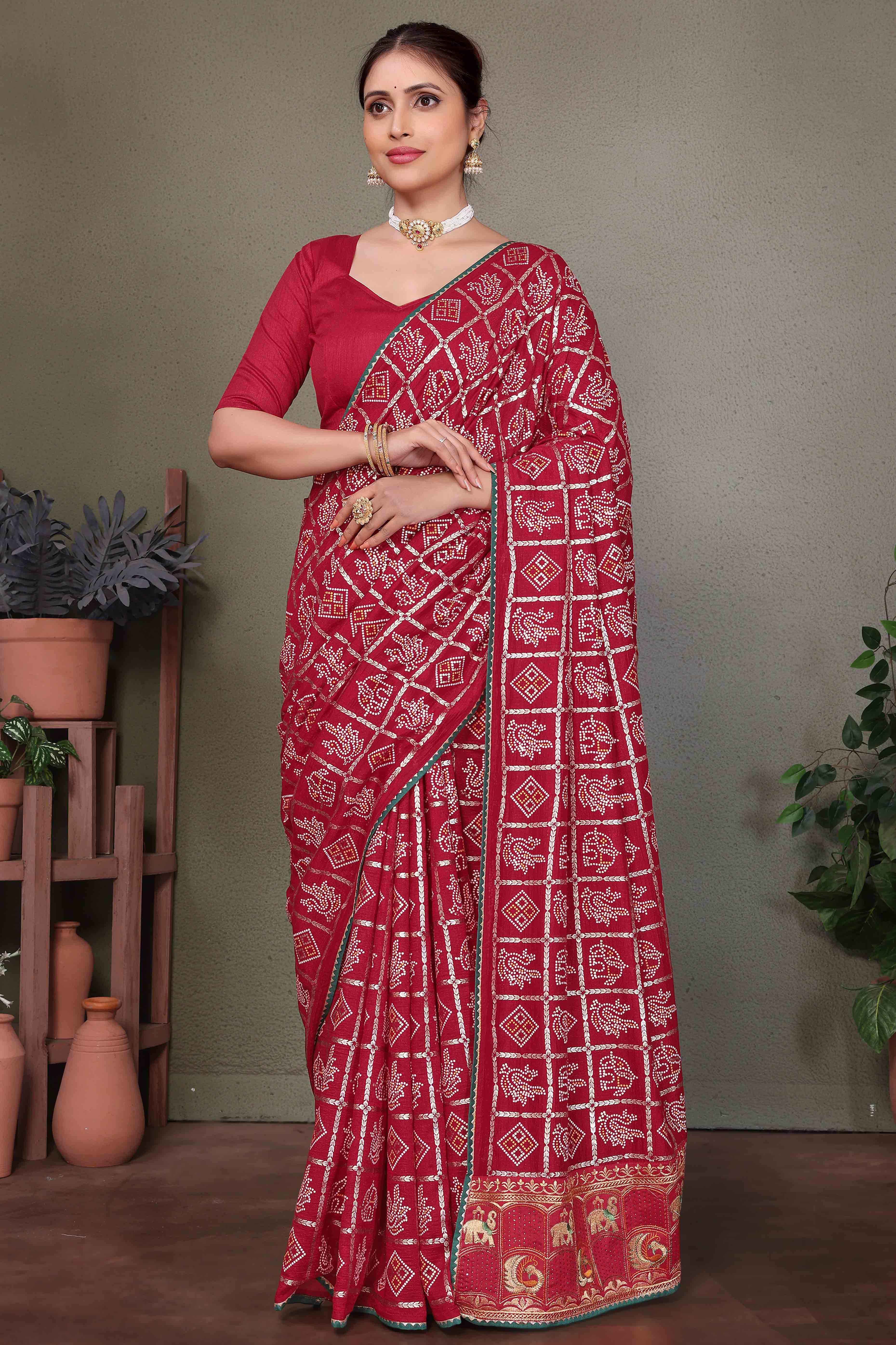 Maroon Vichitra Silk Saree Featuring Bandhani Patterns and Graceful Embroidered Borders