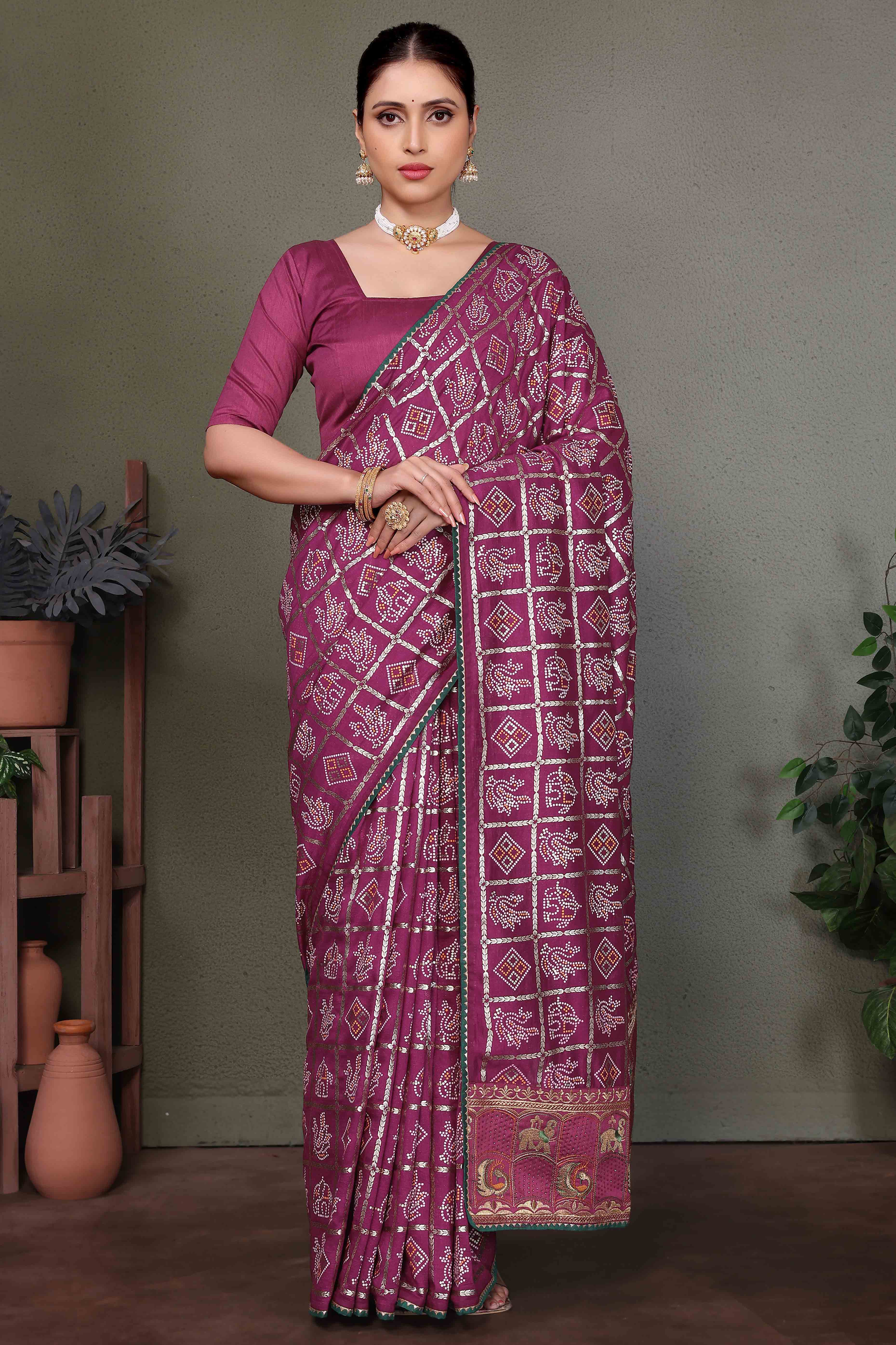 Purple Vichitra Silk Saree Featuring Bandhani Patterns and Graceful Embroidered Borders