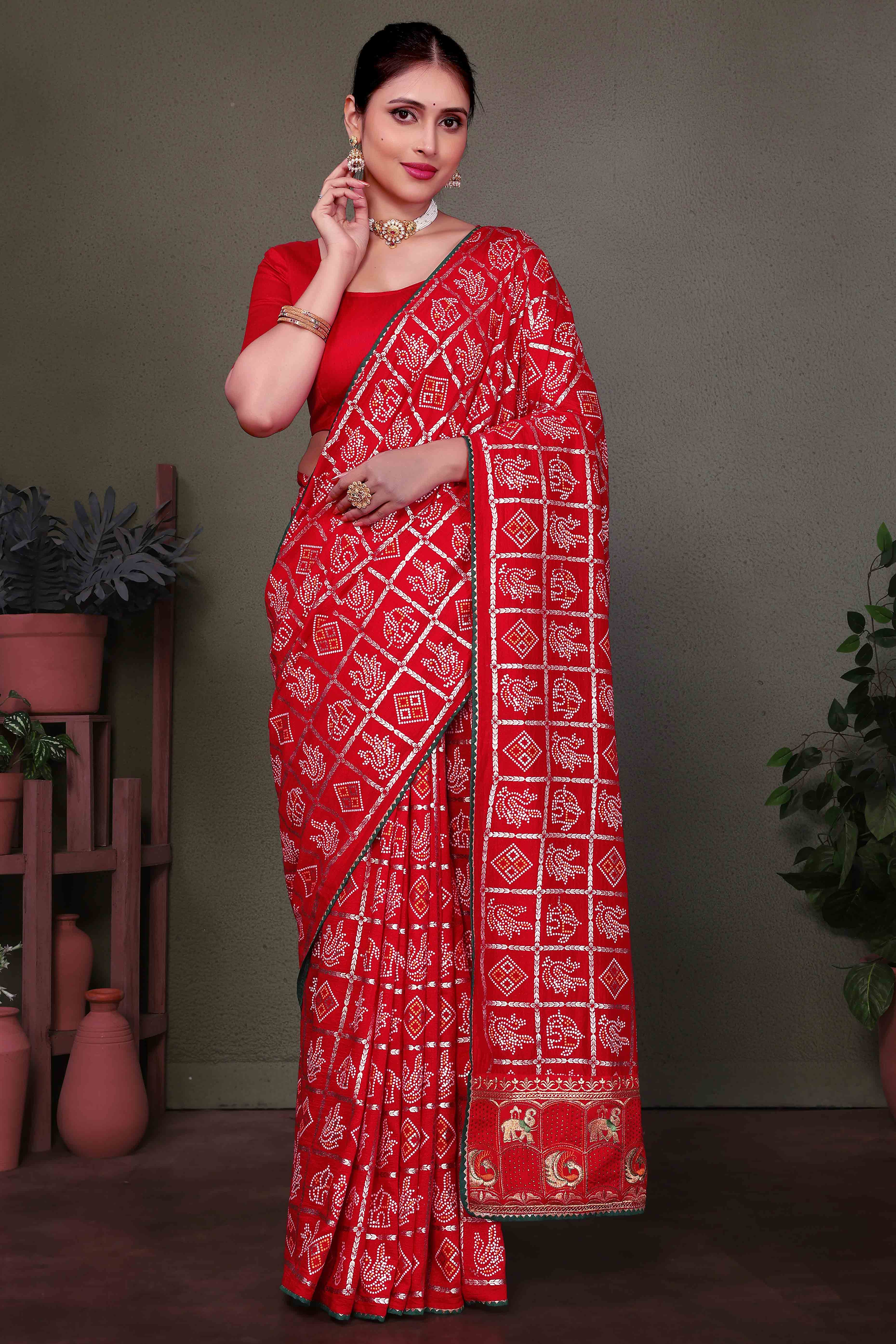 Red Vichitra Silk Saree Featuring Bandhani Patterns and Graceful Embroidered Borders