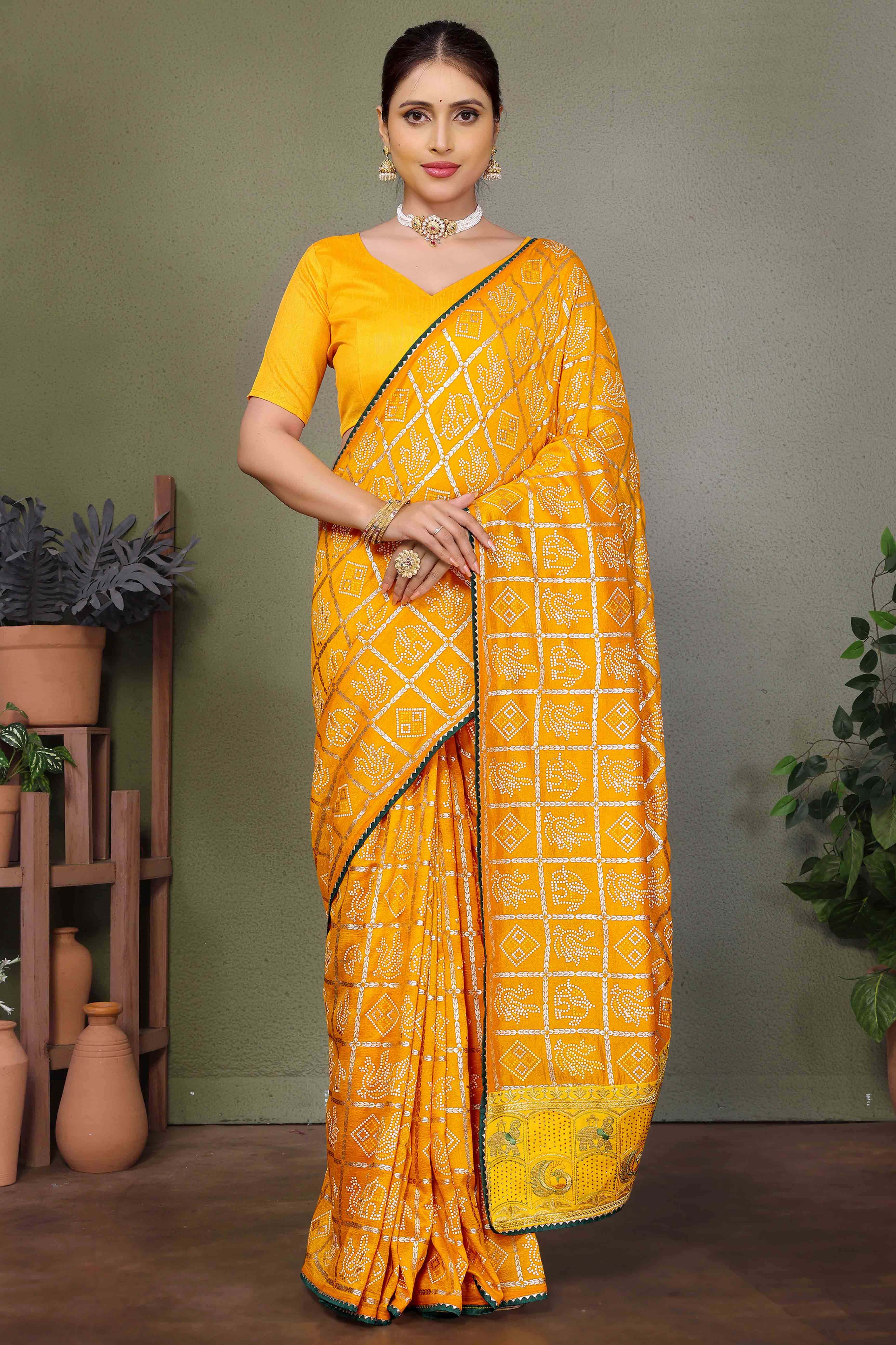 Yellow Vichitra Silk Saree Featuring Bandhani Patterns and Graceful Embroidered Borders