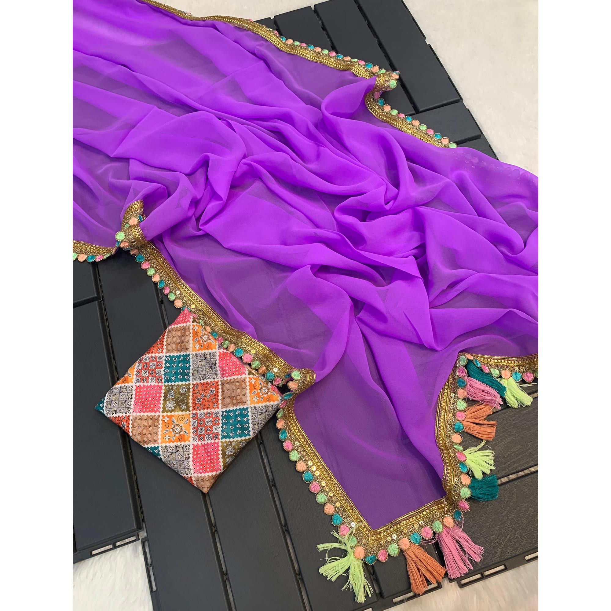 Purple Solid Georgette Saree With Sequins Embroidered Border