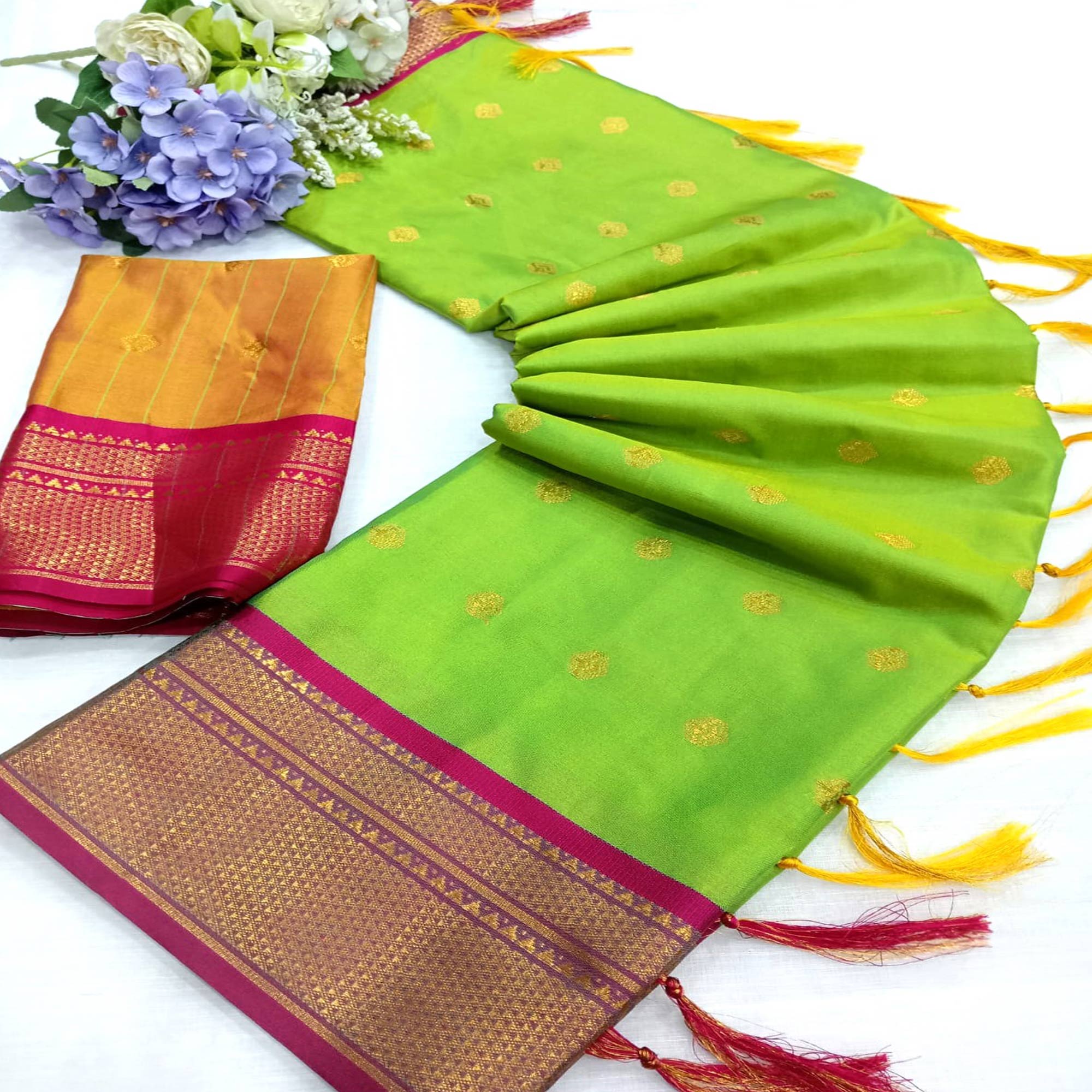 Green Zari Woven Lichi Art Silk Saree With Tassels