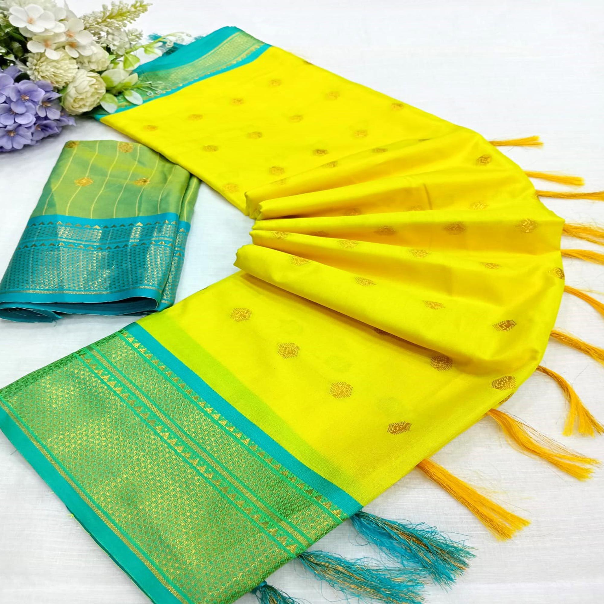 Lemon Yellow Zari Woven Lichi Art Silk Saree With Tassels