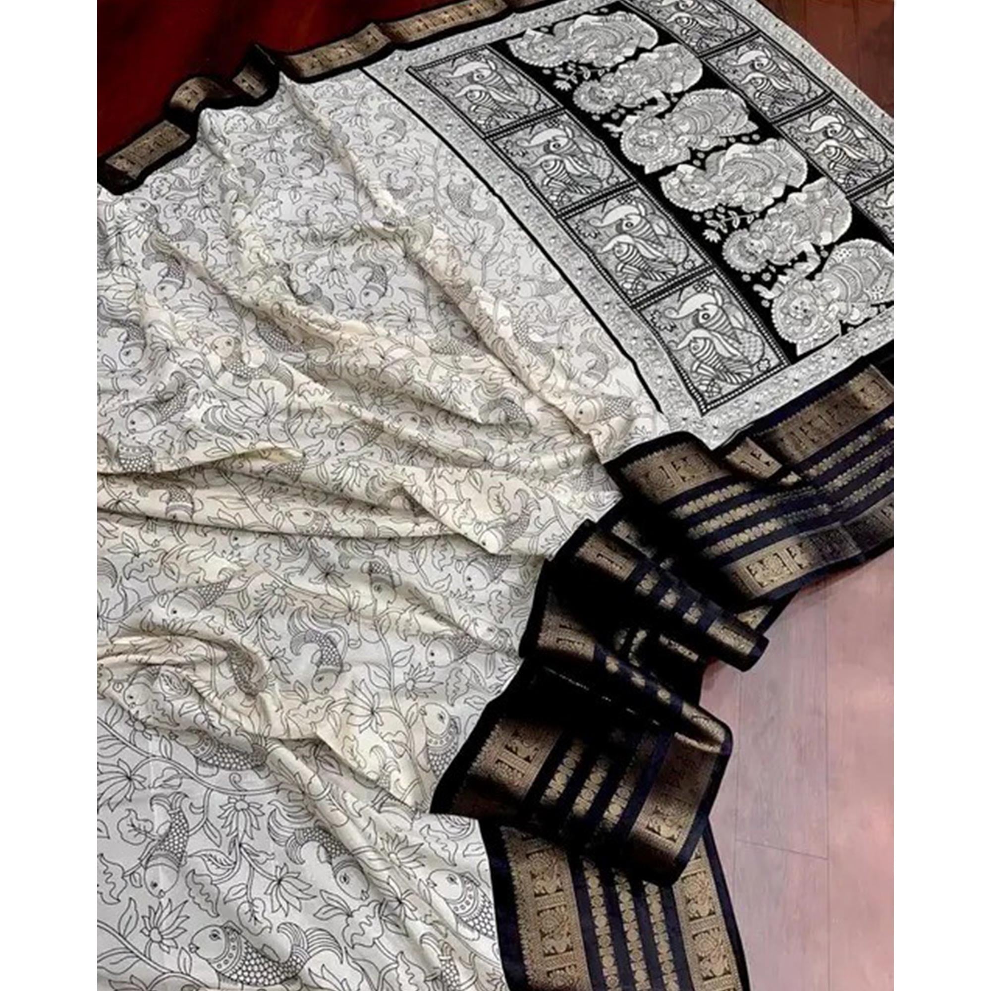 Off White & Black Floral Printed Dola Silk Saree With Zari Border