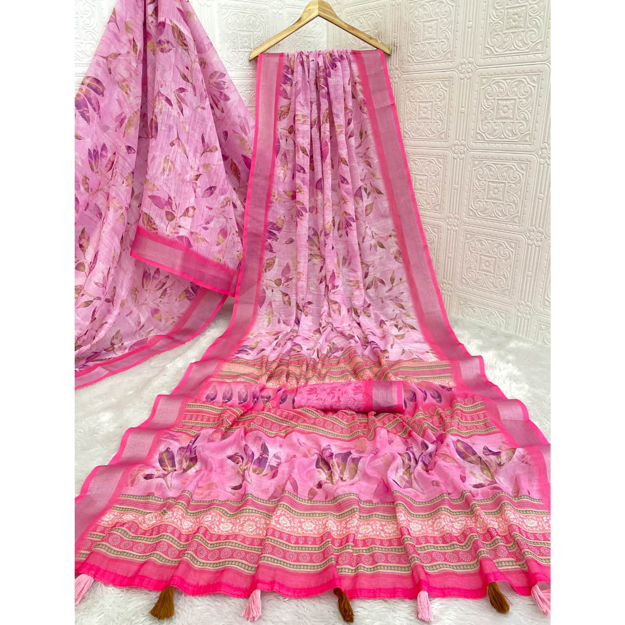 Charming Pink Floral Linen Cotton Saree Adorned With Elegant Tassel Detailing
