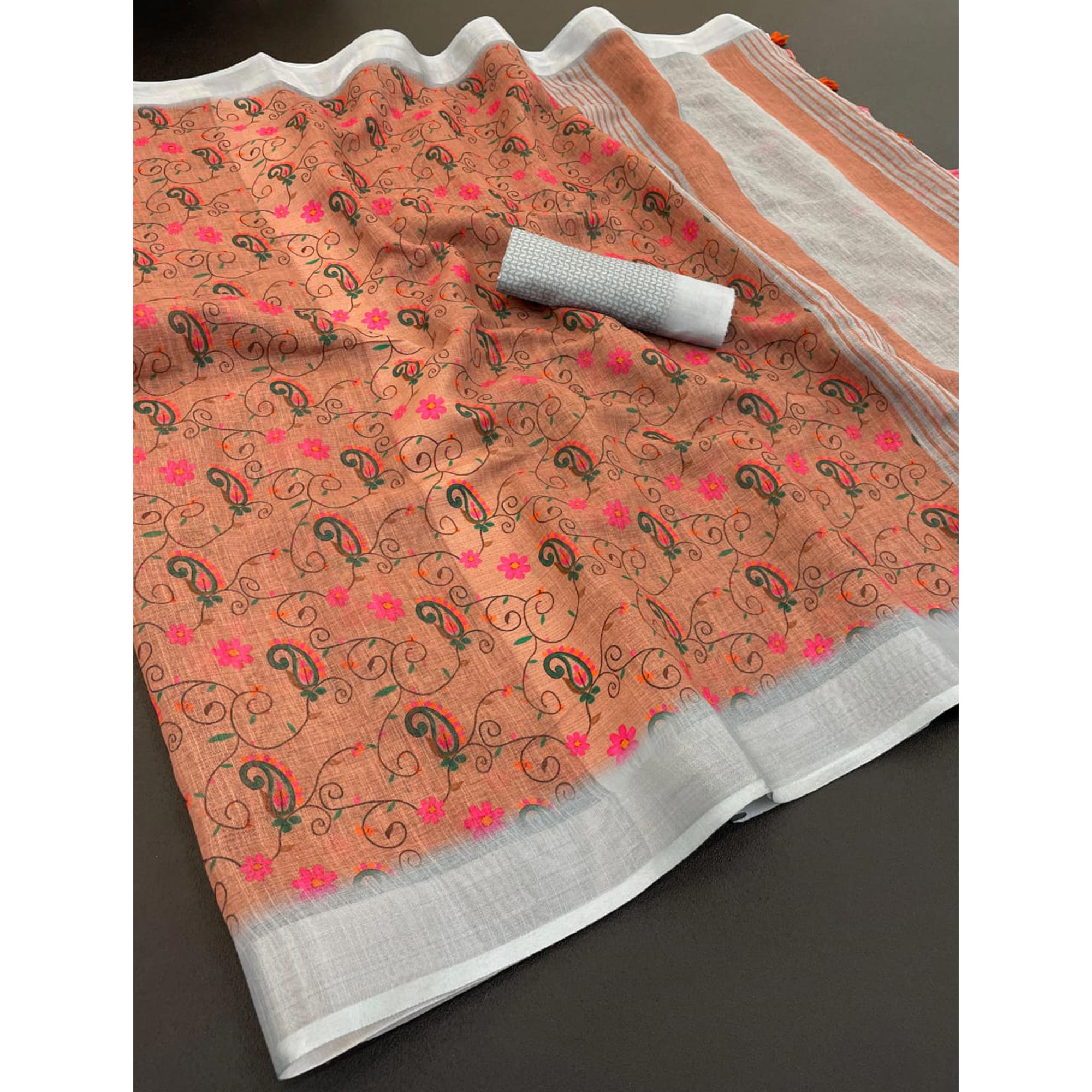 Dusty Peach Floral Printed Linen Cotton Saree With Delicate Tassel Detailing