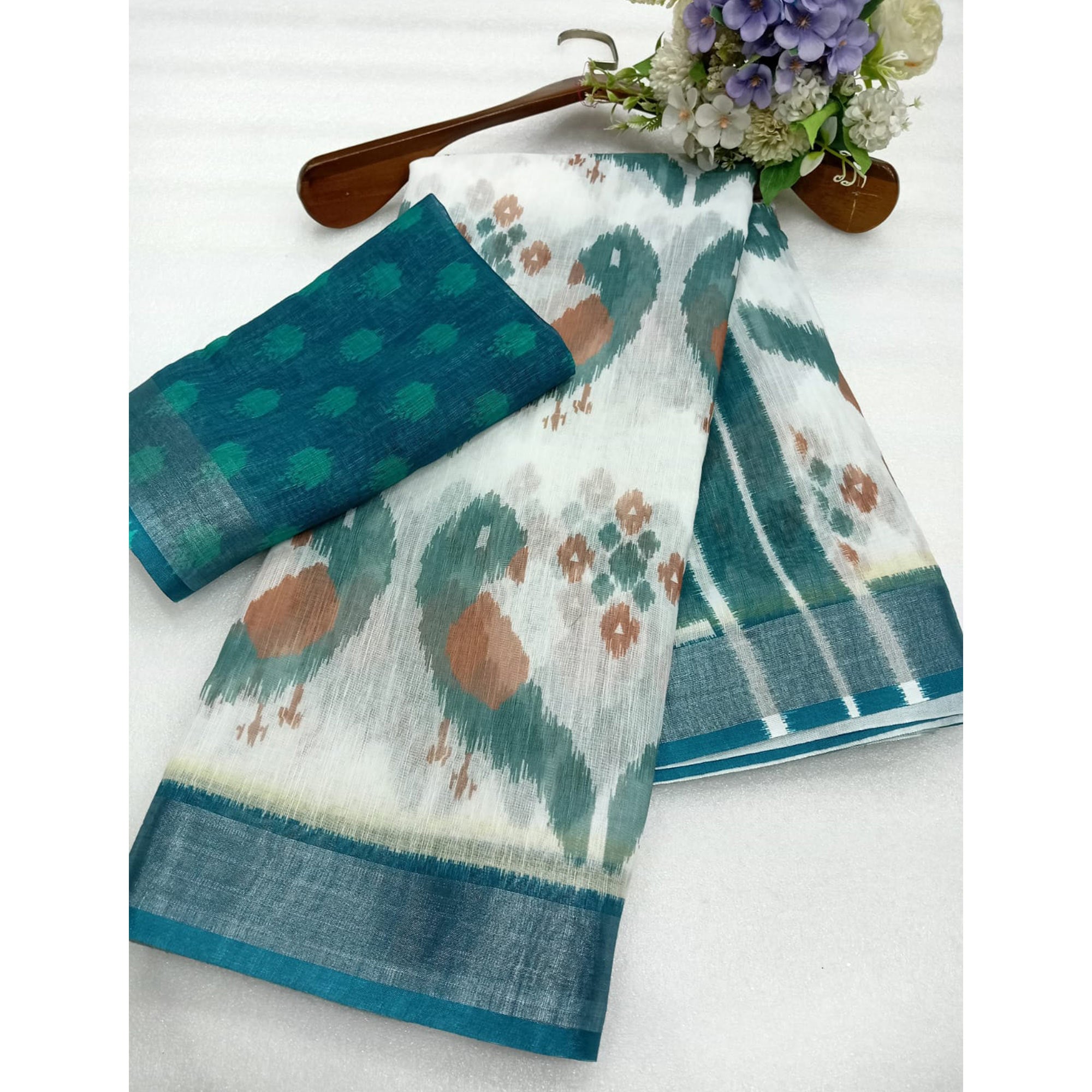 Teal Ikkat Printed Linen Saree