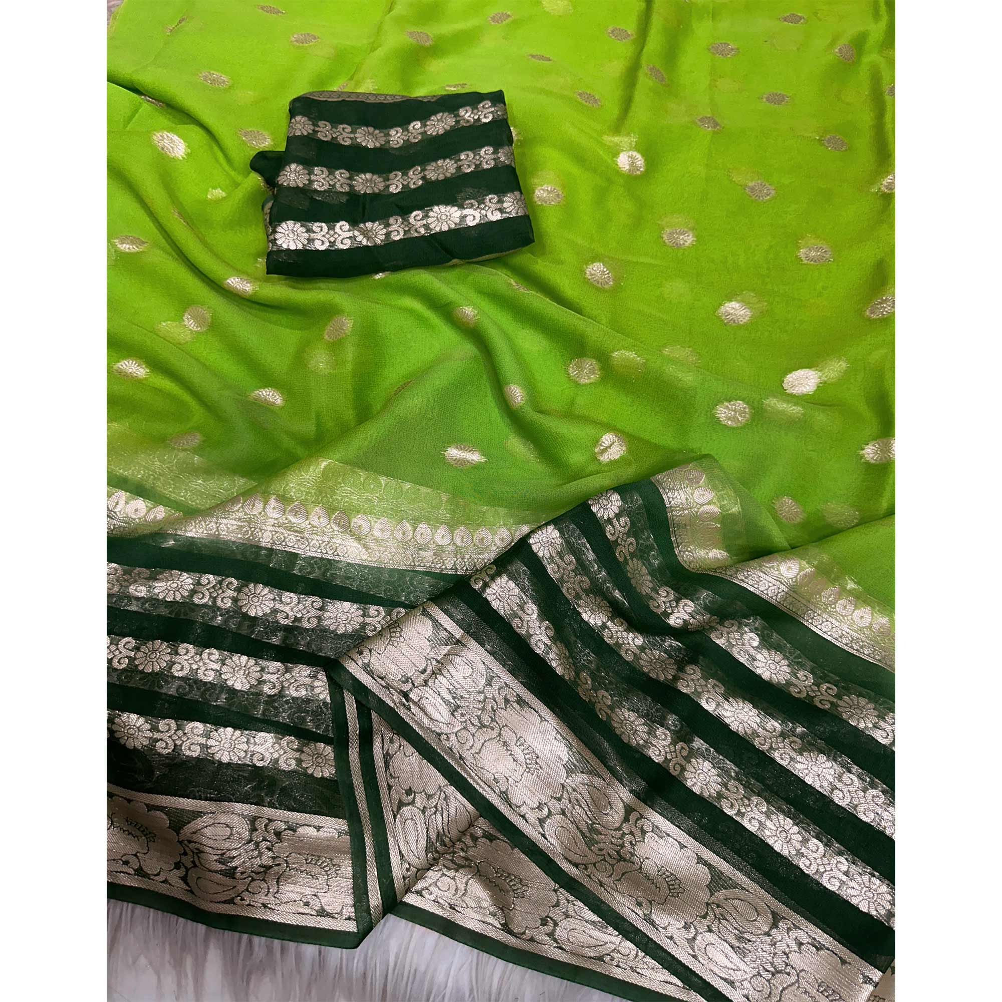 Green Saree In Pure Viscose Featuring Intricate Floral Zari Weaving