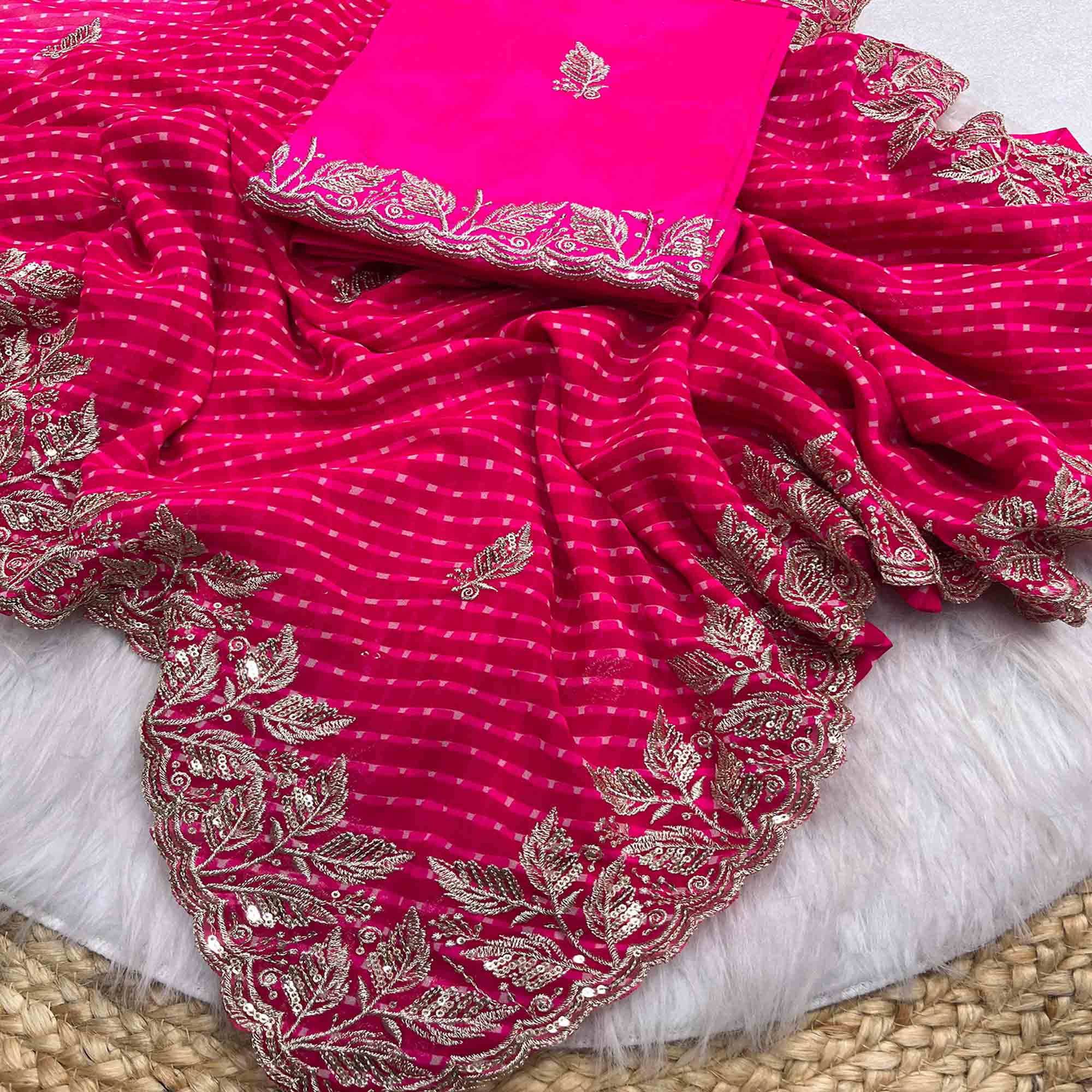 Pink Bandhani Georgette Saree Enhanced with Lavish Embroidered Border