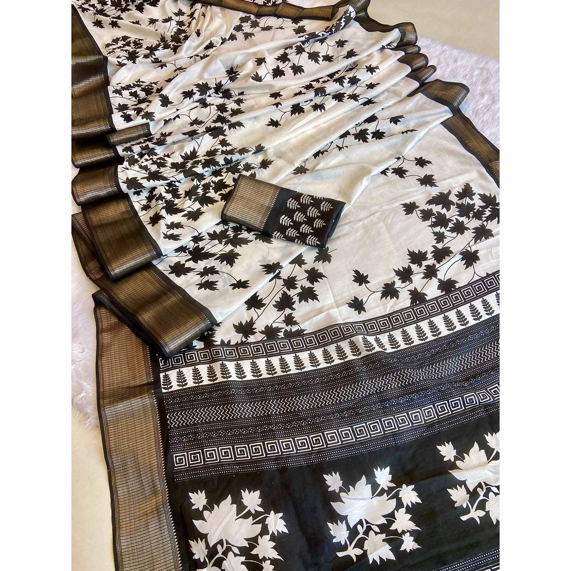 White & Black Floral Printed Dola Silk Saree With Woven Border