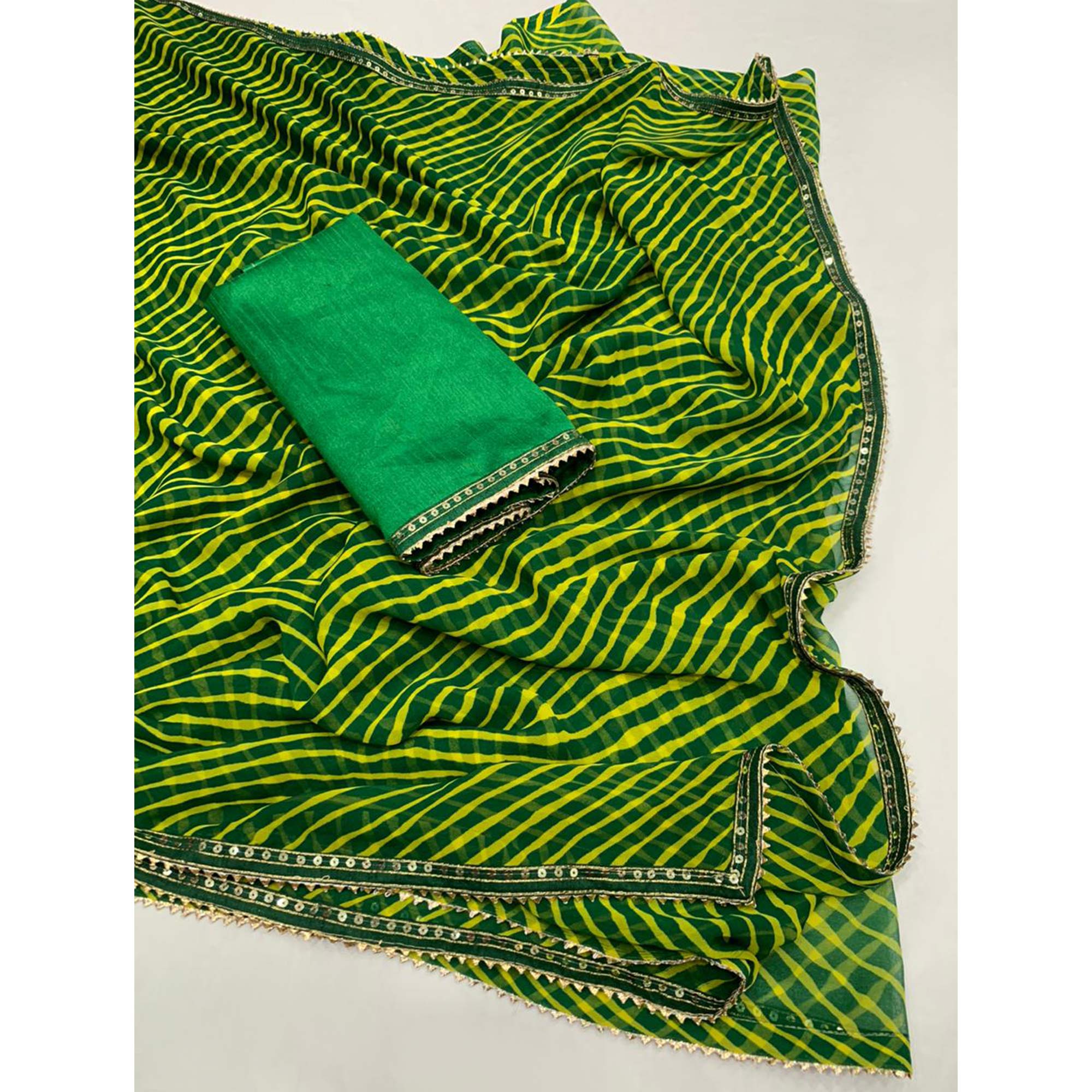 Green & Yellow Printed Georgette Saree With Sequins Border